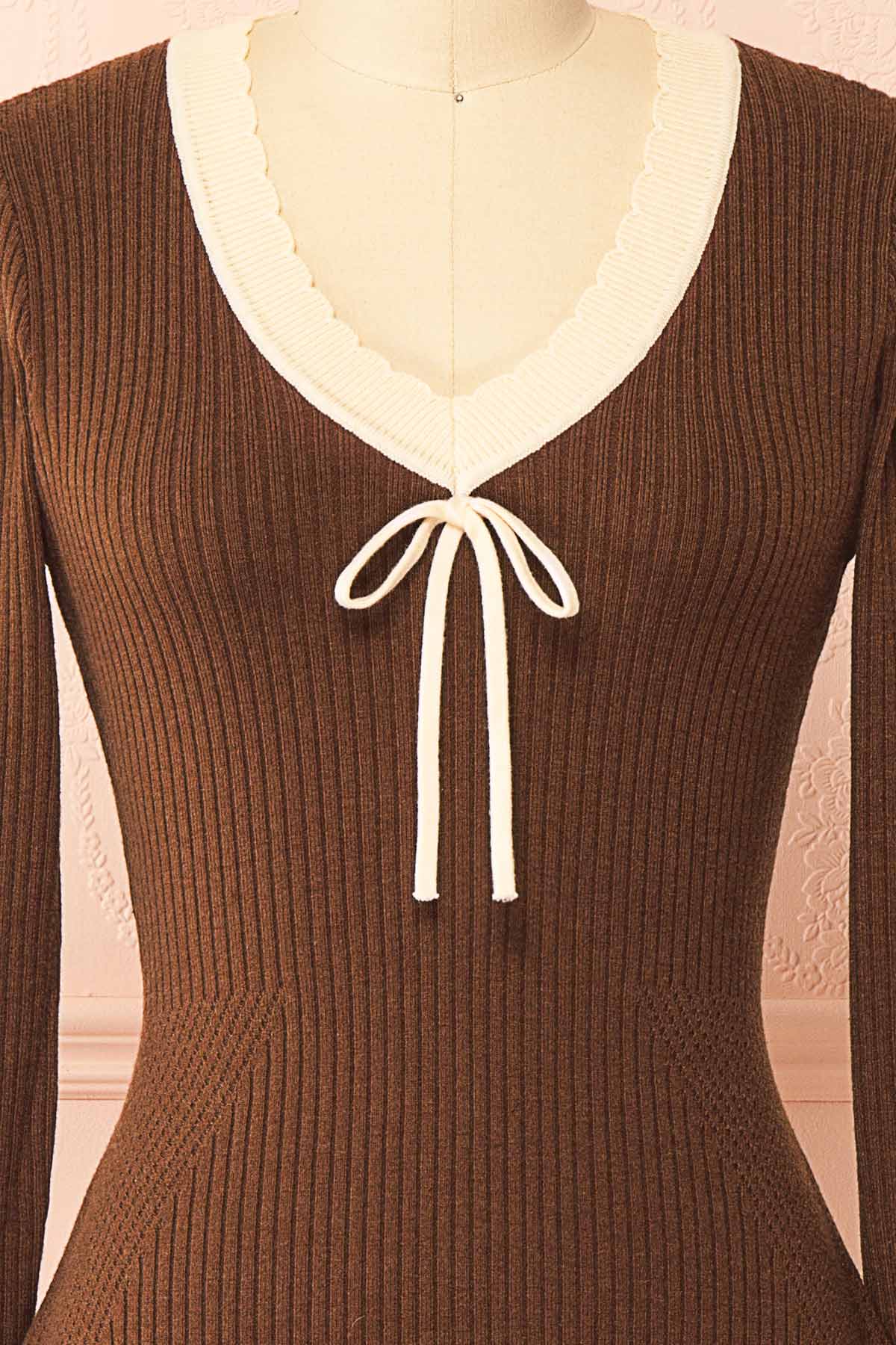 details view of Sabrinne Brown Ribbed Knit Long Sleeve Mini Dress with Contrast Ruffle Trim at Boutique 1861