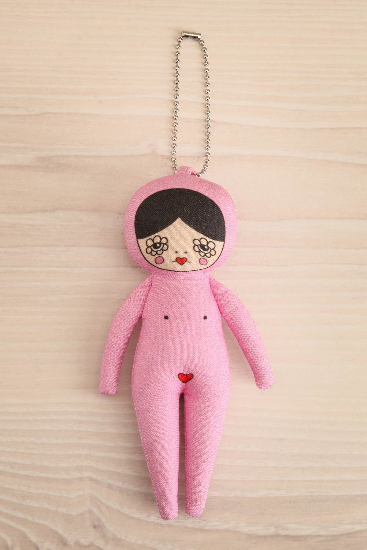 view of light Safia Pink Jumpsuit Doll Bag Charm - 3 options at Maison garçonne