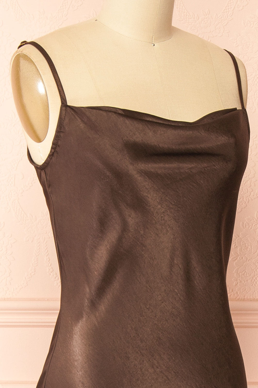 side of a Mannequin wearing the Safiya brown Satin Maxi Dress with Faux Fur Shawl from boutique 1861