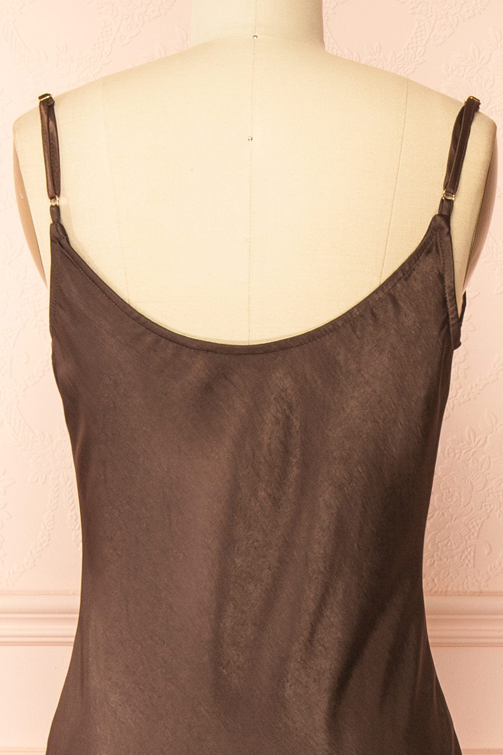 back of a Mannequin wearing the Safiya brown Satin Maxi Dress with Faux Fur Shawl from boutique 1861