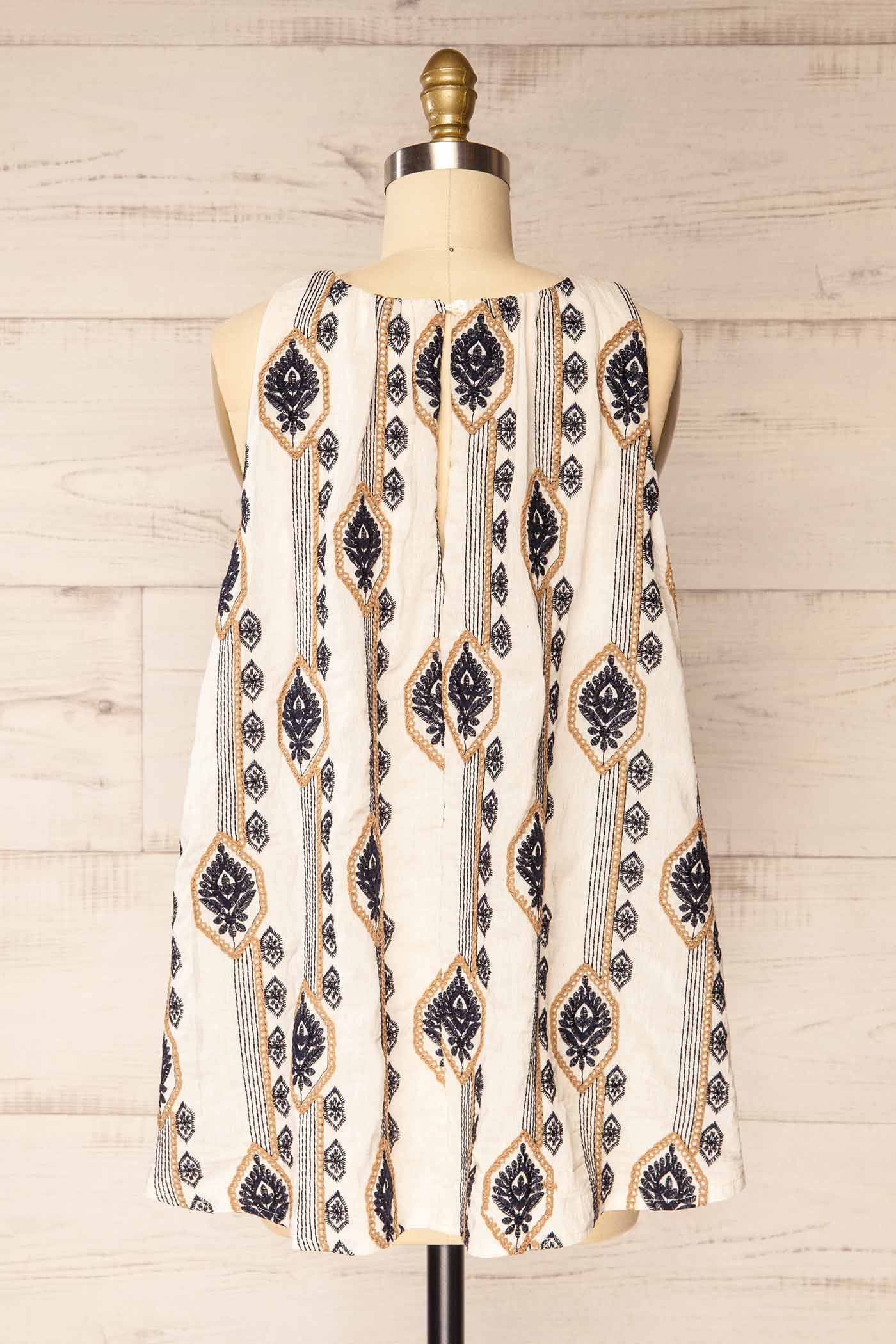 Backview Sancole Ivory High-Neck Blouse Geometric Embroidery at la petite garçonne