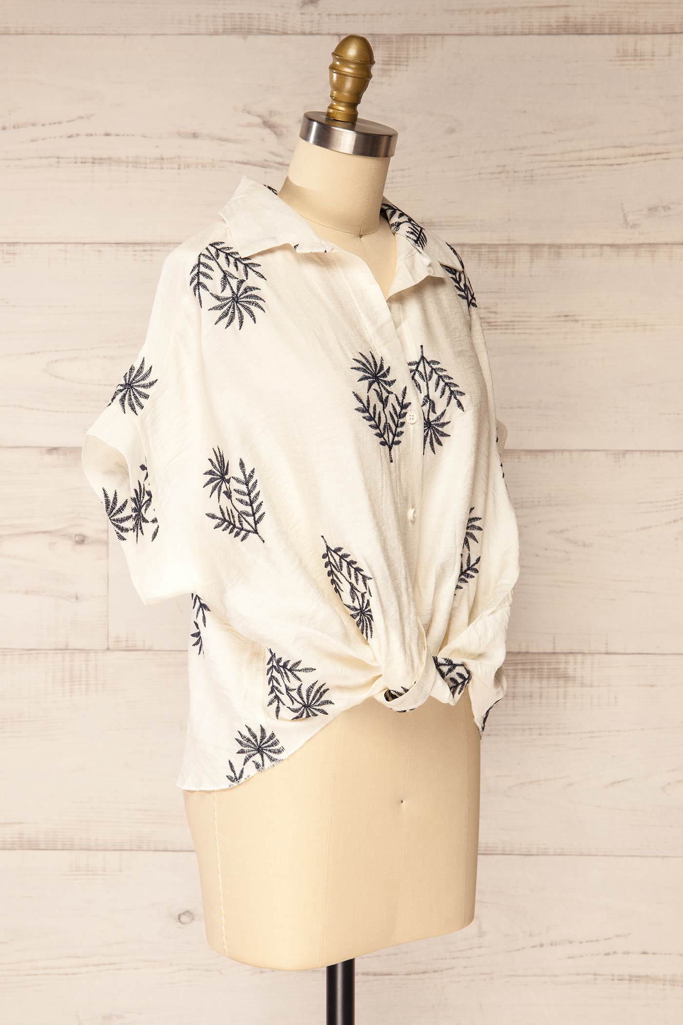 Sideview Sangrur Ivory Shirt with Knotted Hem and Botanical Print at la petite garçonne