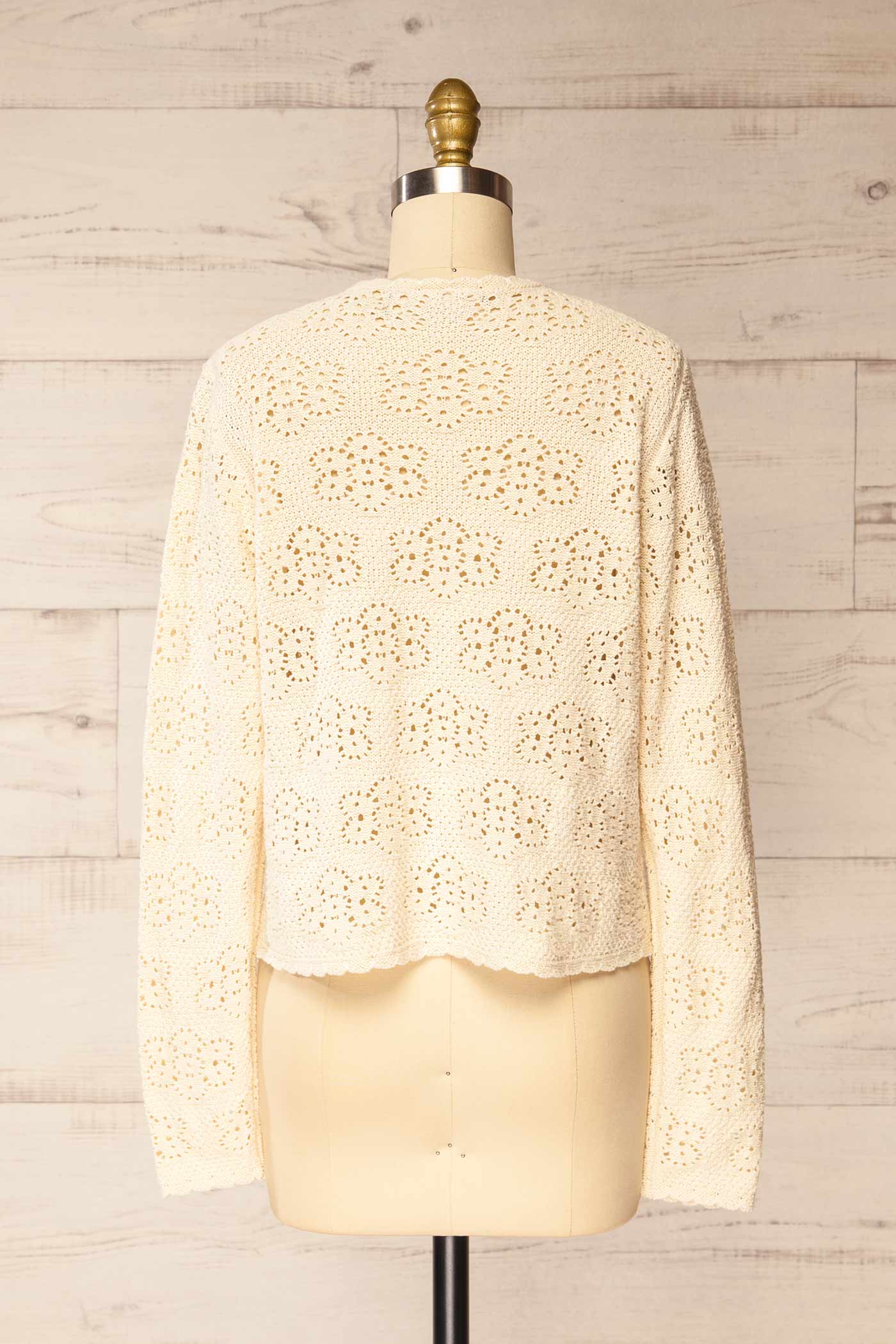 Back view Seoni Cream Openwork Knit Tie-Front Cardigan at la petite garçonne