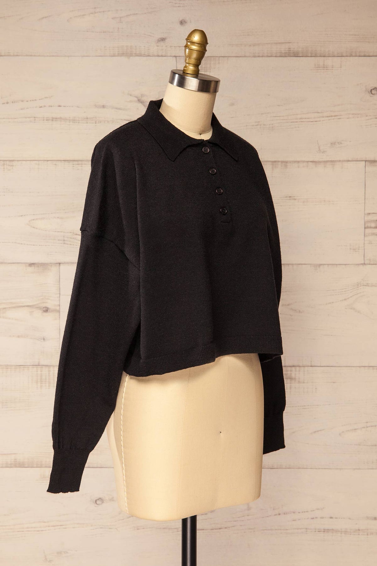 side view of Shigawake Black Cropped Polo Sweater at La petite garçonne