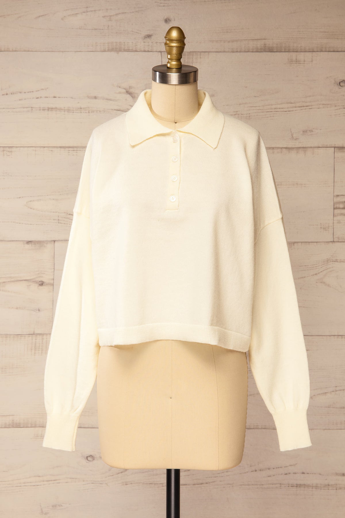 front view of Shigawake Ivory Cropped Polo Sweater at La petite garçonne