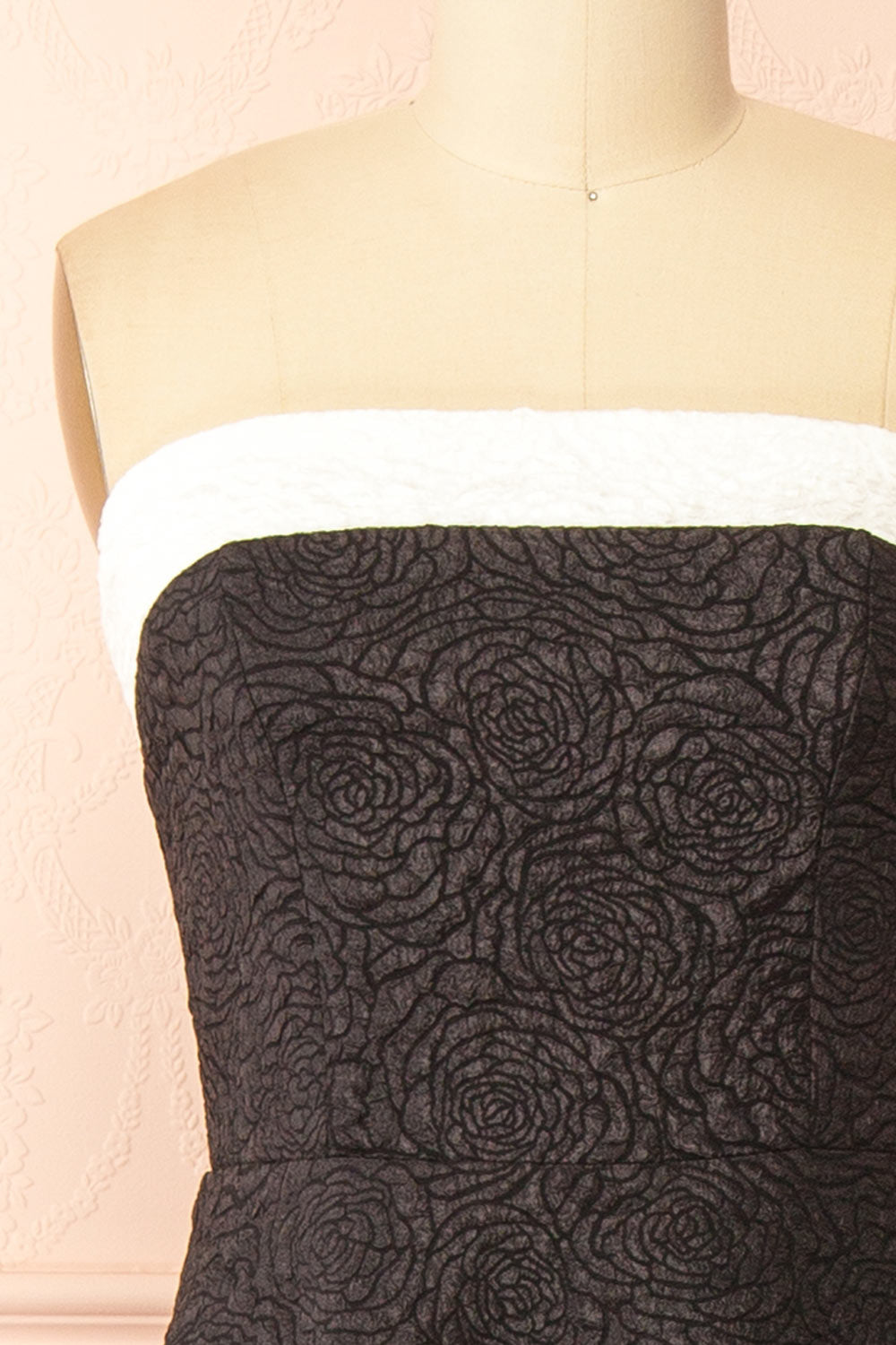 front of a mannequin wearing Solana Black Dress with Floral Waffled Texture from boutique 1861