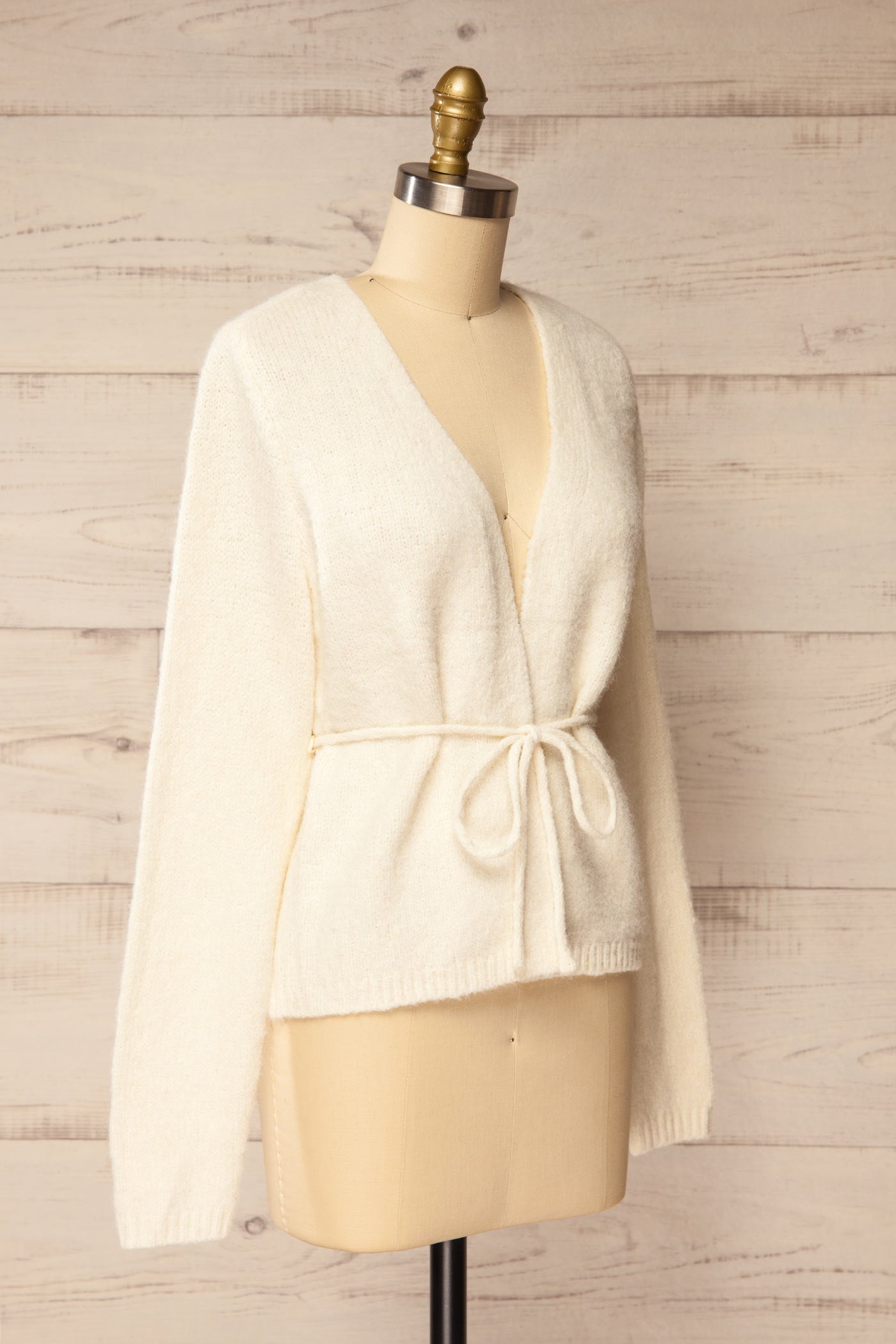 side view of Sovo Ivory Soft Knit Tie-Waist Wrap Cardigan at La petite garçonne
