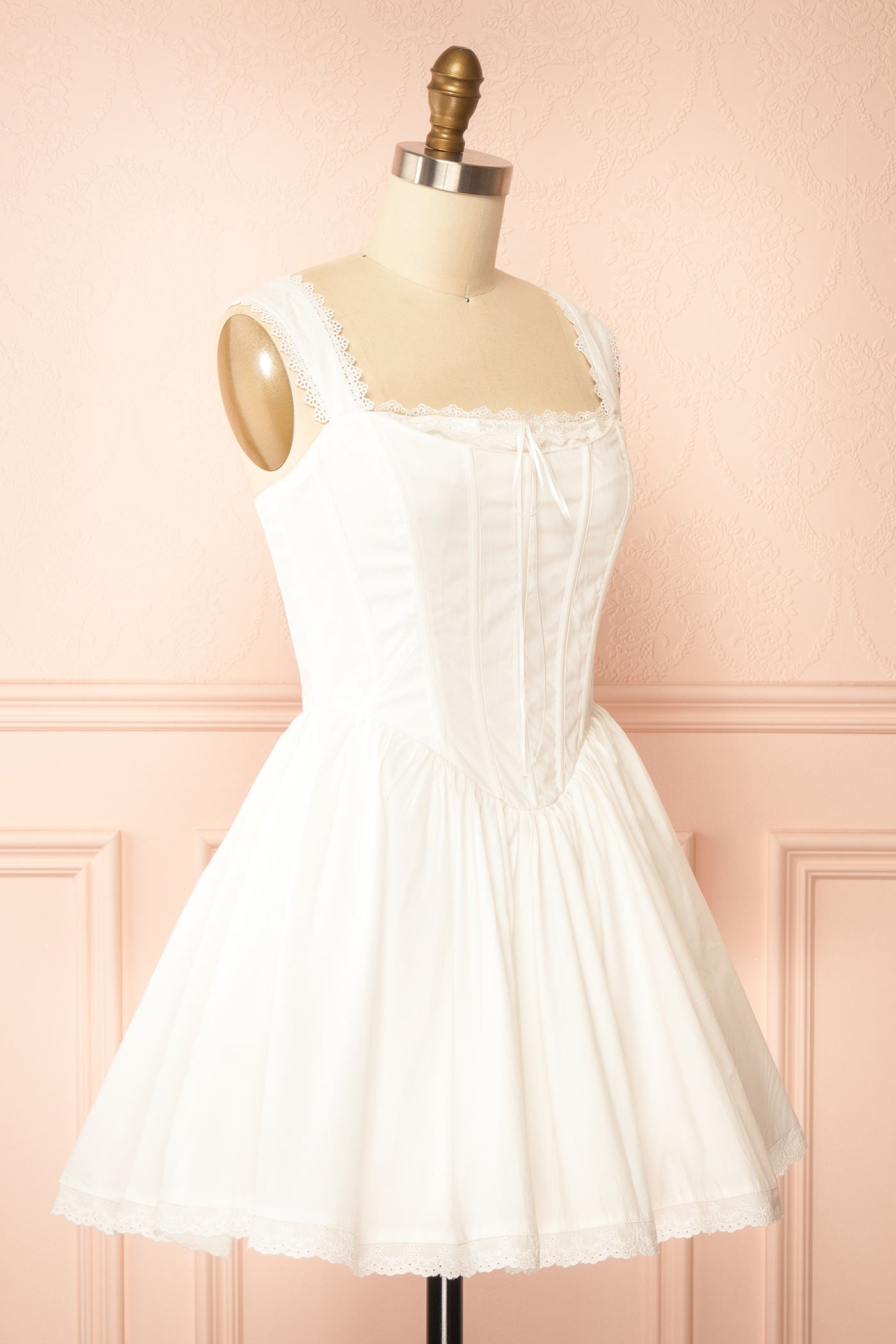 Sideview Sylthia White Corset Dress with Pockets at la boutique 1861