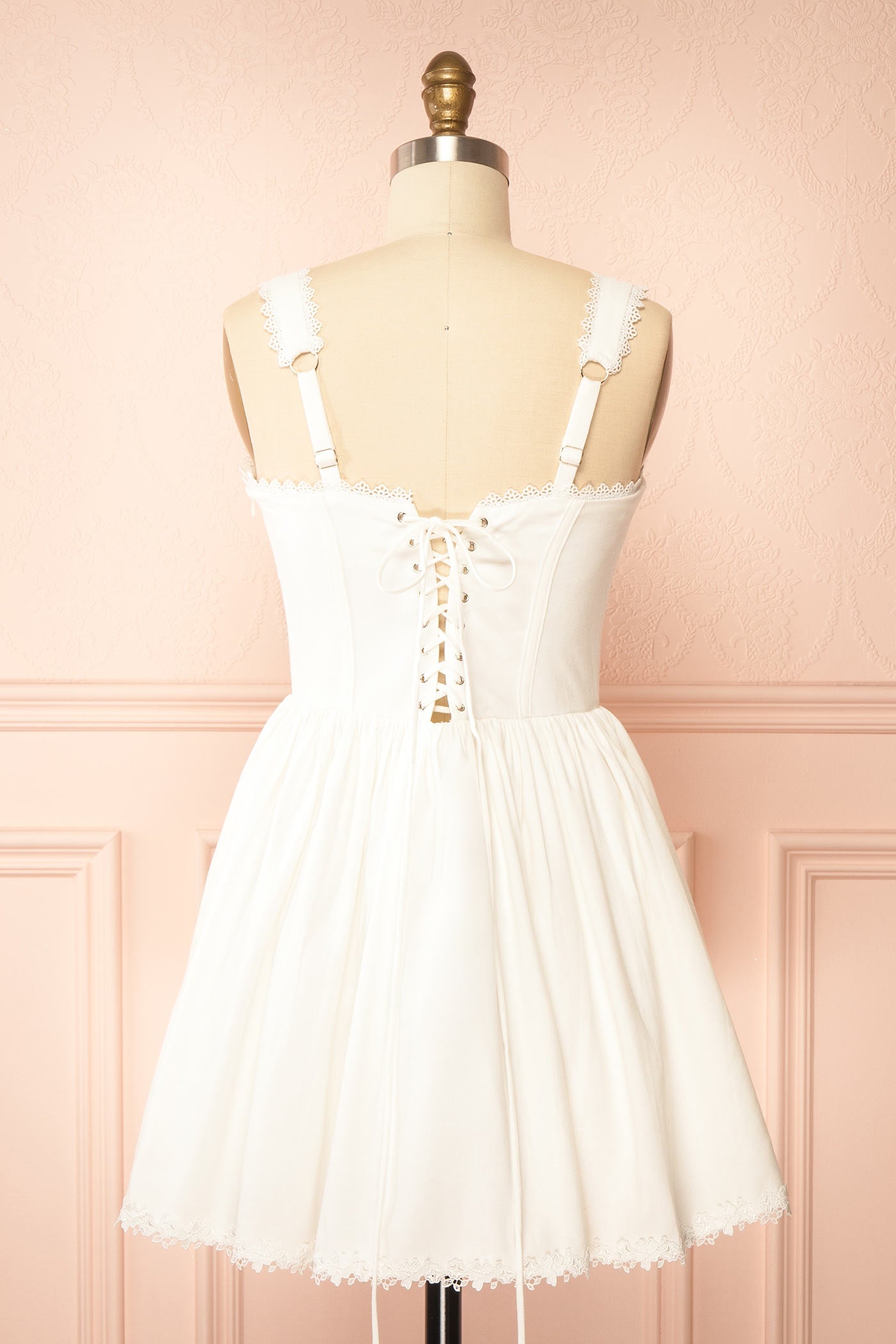 Backview Sylvaine White Short Dress with Lace-Up Back and Pockets at la boutique 1861
