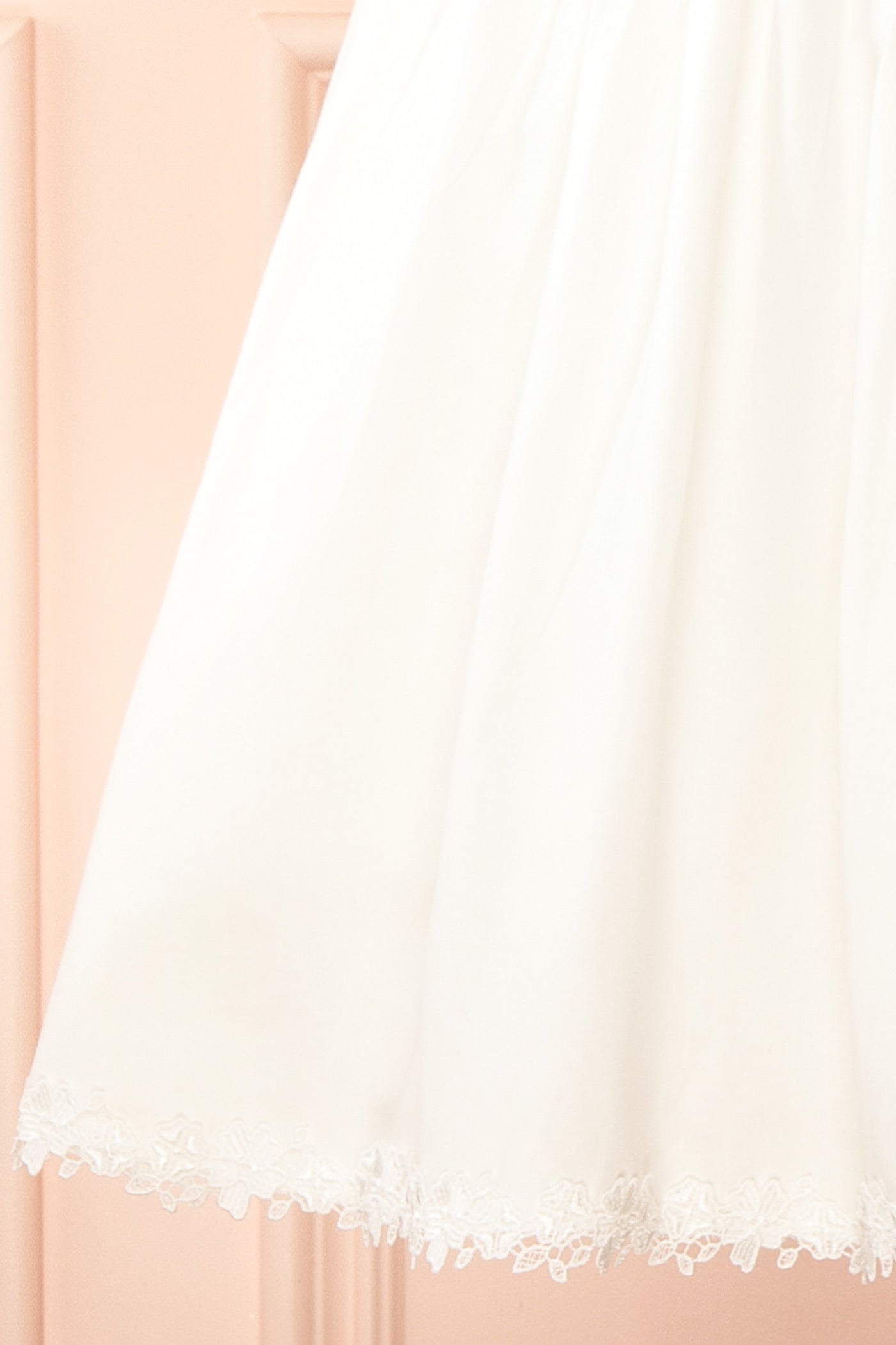 Close-up Sylvaine White Short Dress with Lace-Up Back and Pockets at la boutique 1861