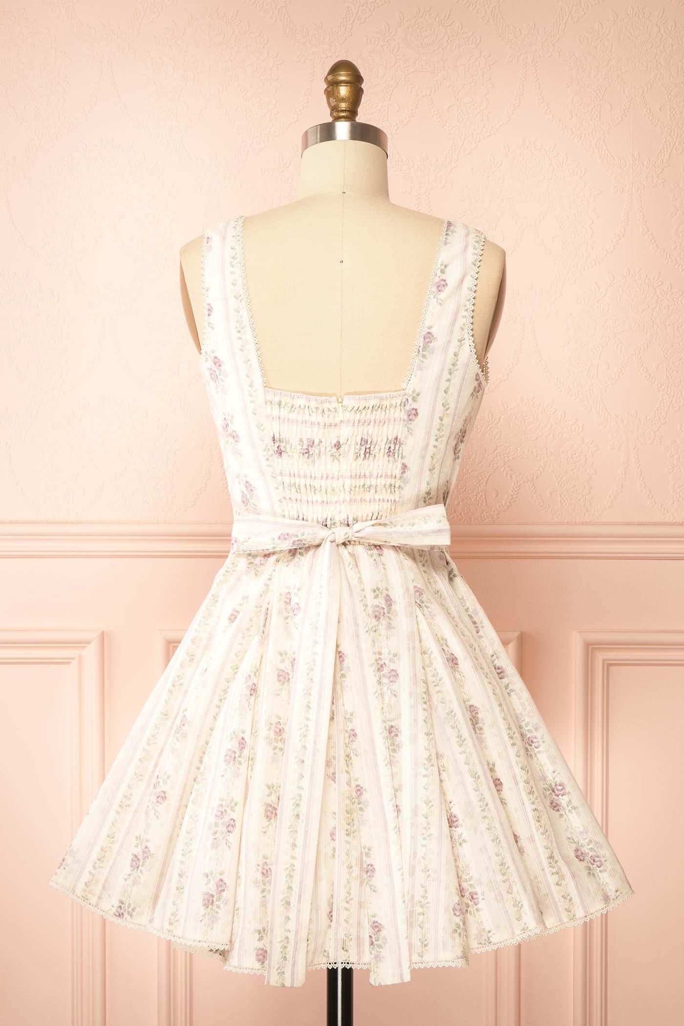 Backview Theane Mauve Floral Short Dress with Back Bow at la boutique 1861