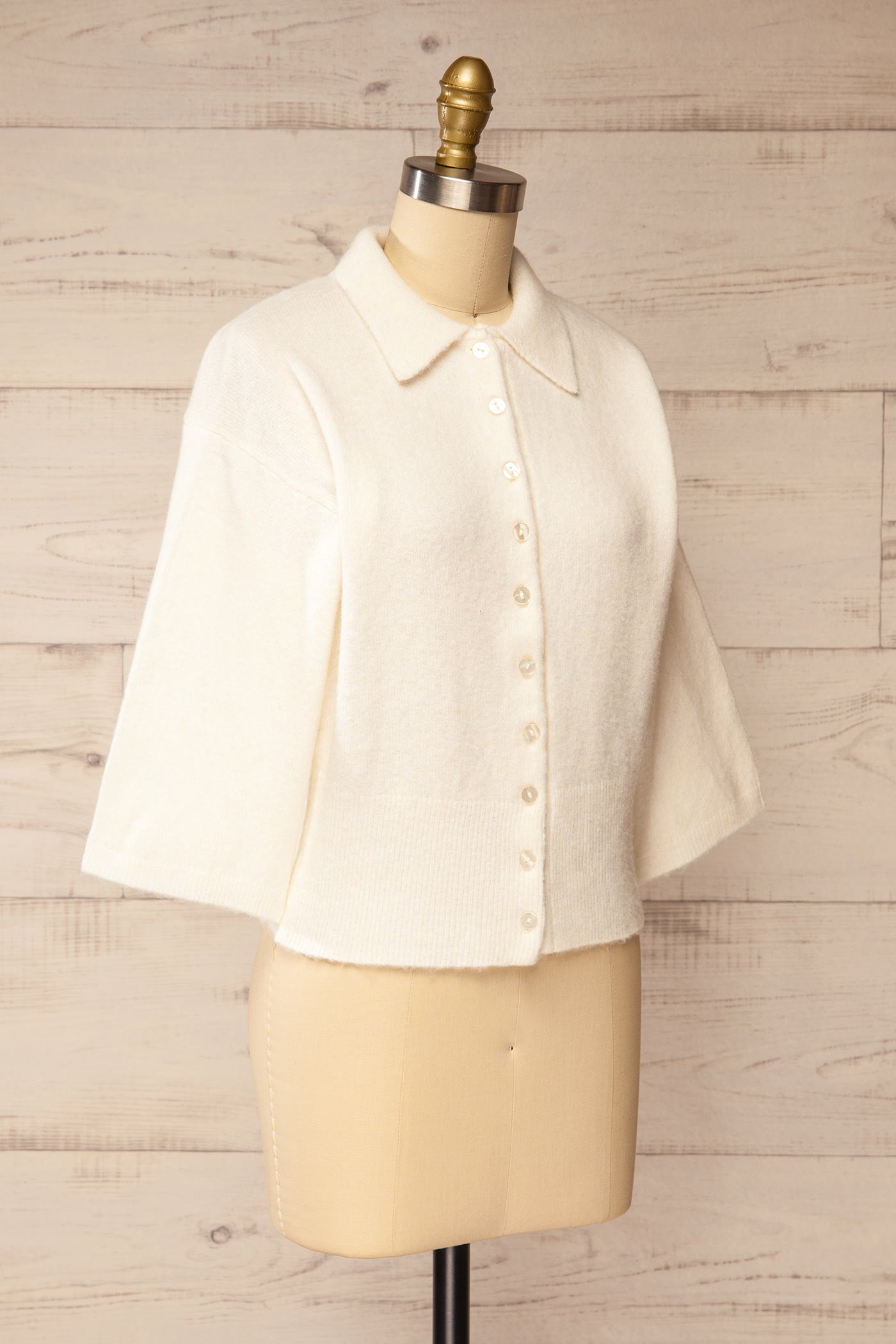 side view of Tierbo Ivory Cardigan with 3/4 Sleeves at La petite garçonne