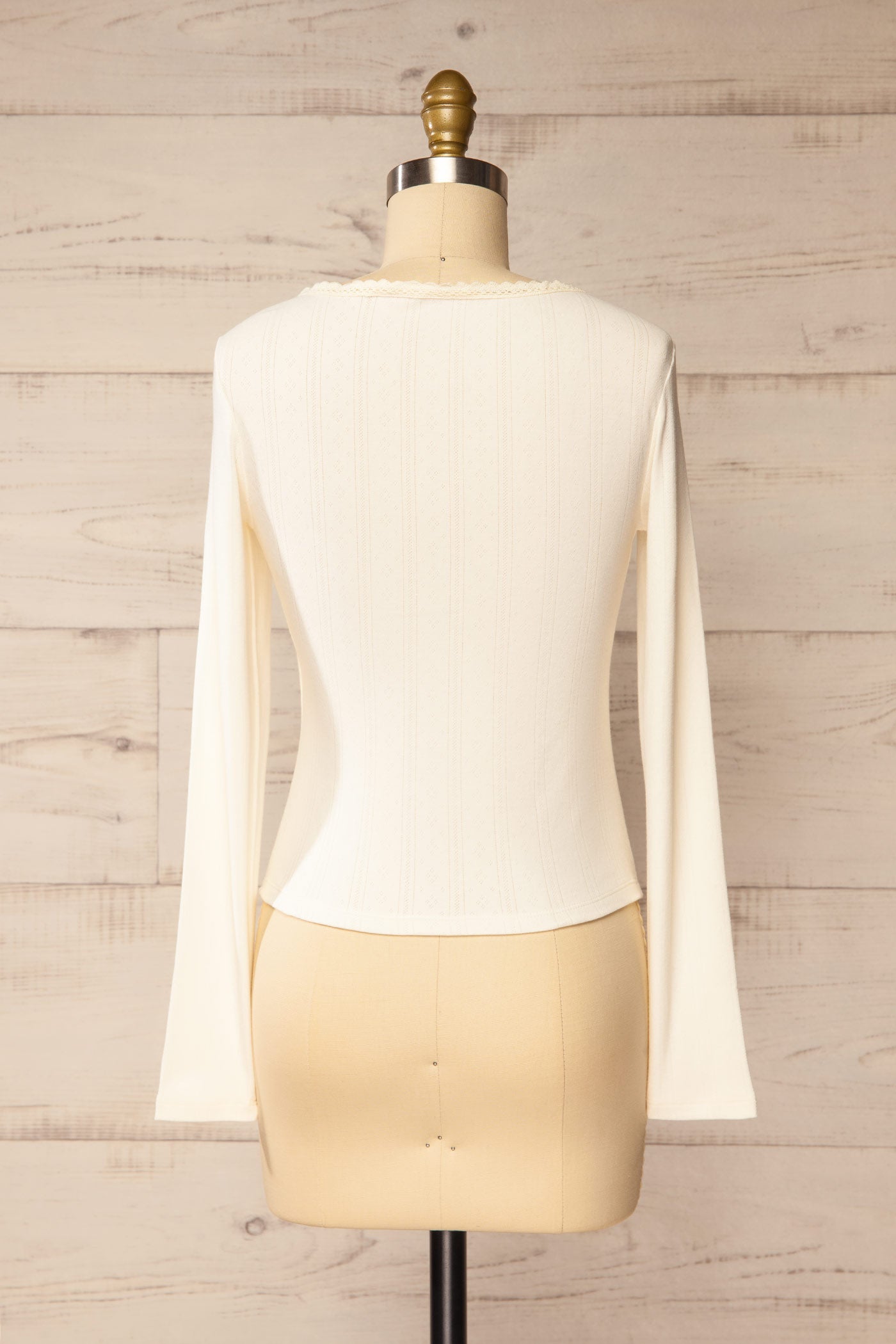 back view of Toulal Ivory Lace-Trim Pointelle Long-Sleeve Top at La petite garçonne