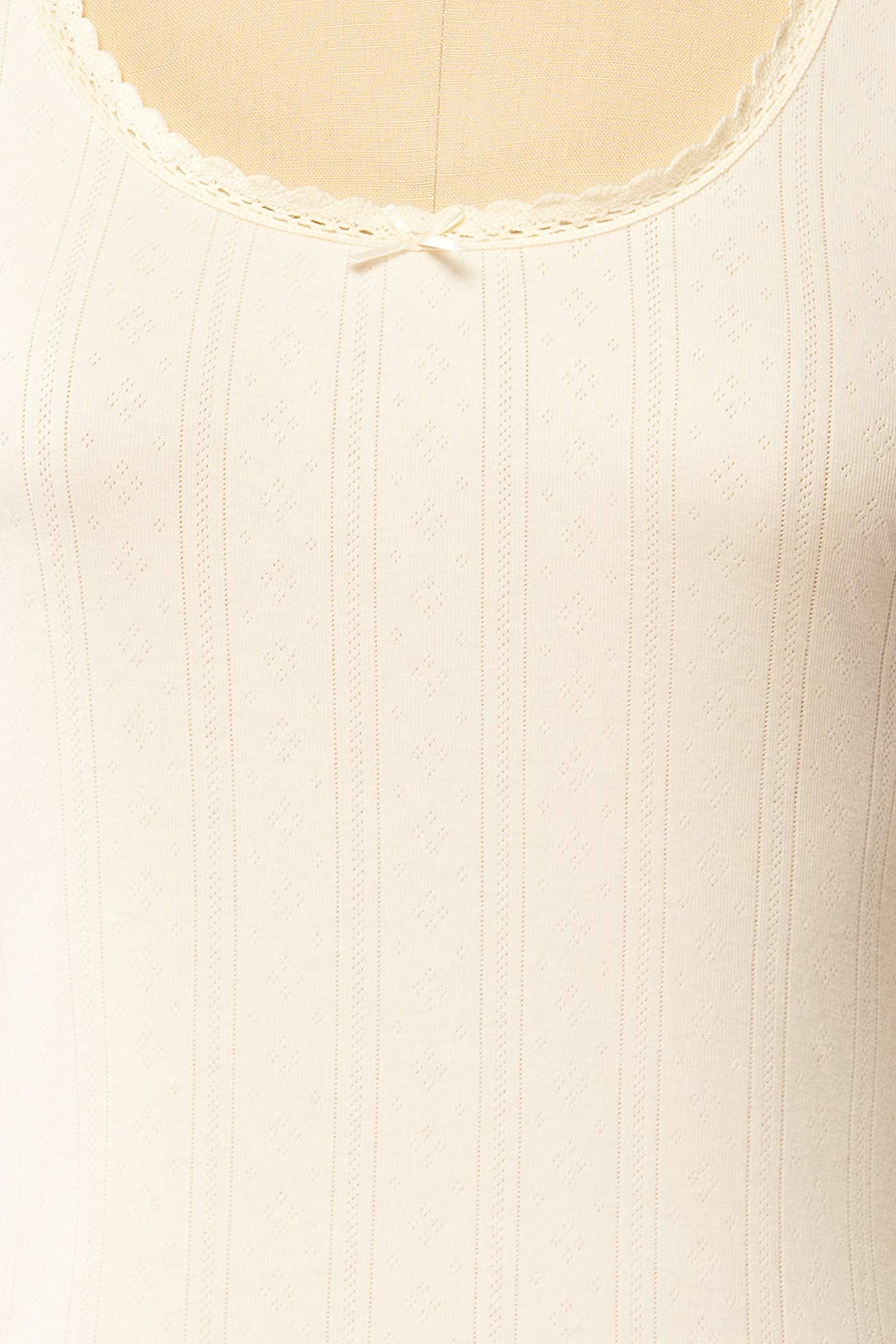 fabric view of Toulal Ivory Lace-Trim Pointelle Long-Sleeve Top at La petite garçonne