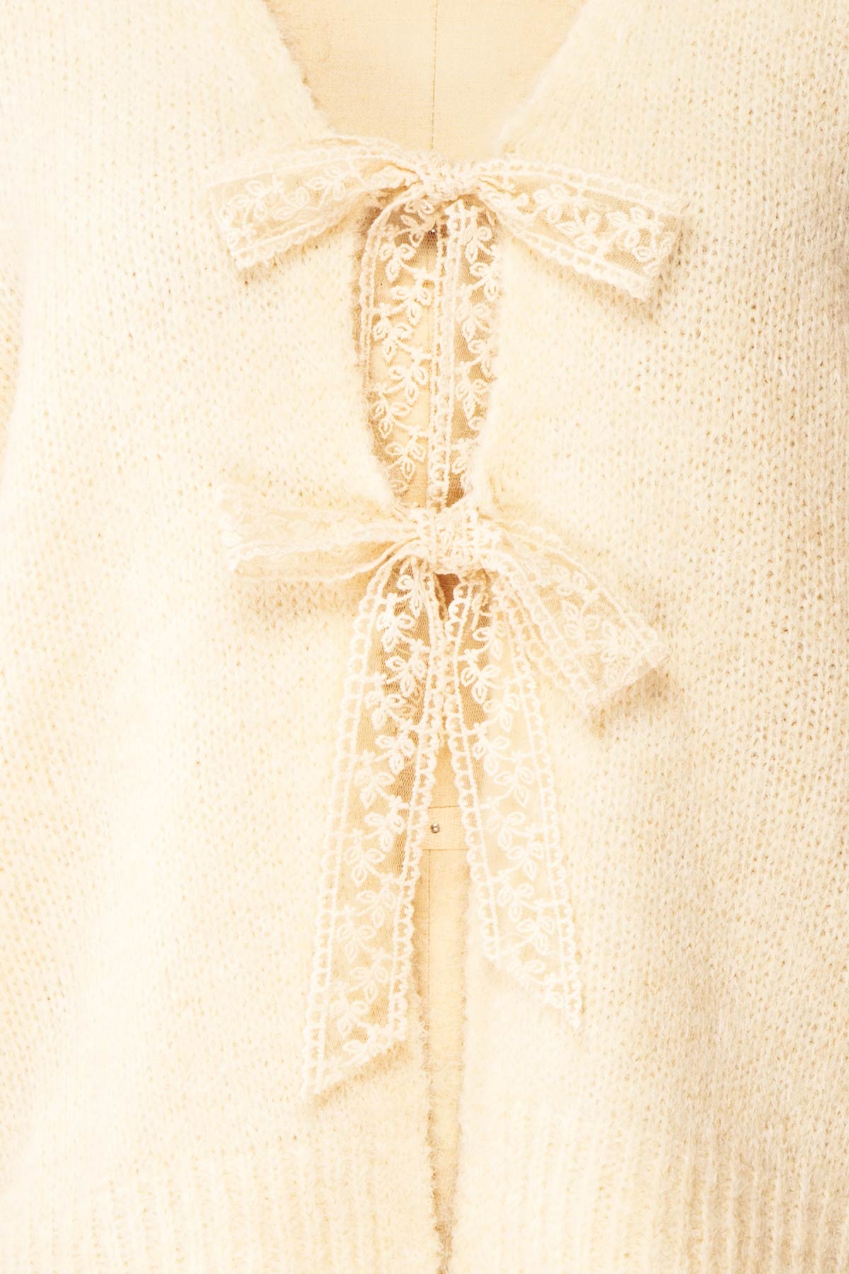 fabric view of Tsubaki Beige Knit V-Neck Cardigan Sweater with Lace Bows at Boutique 1861