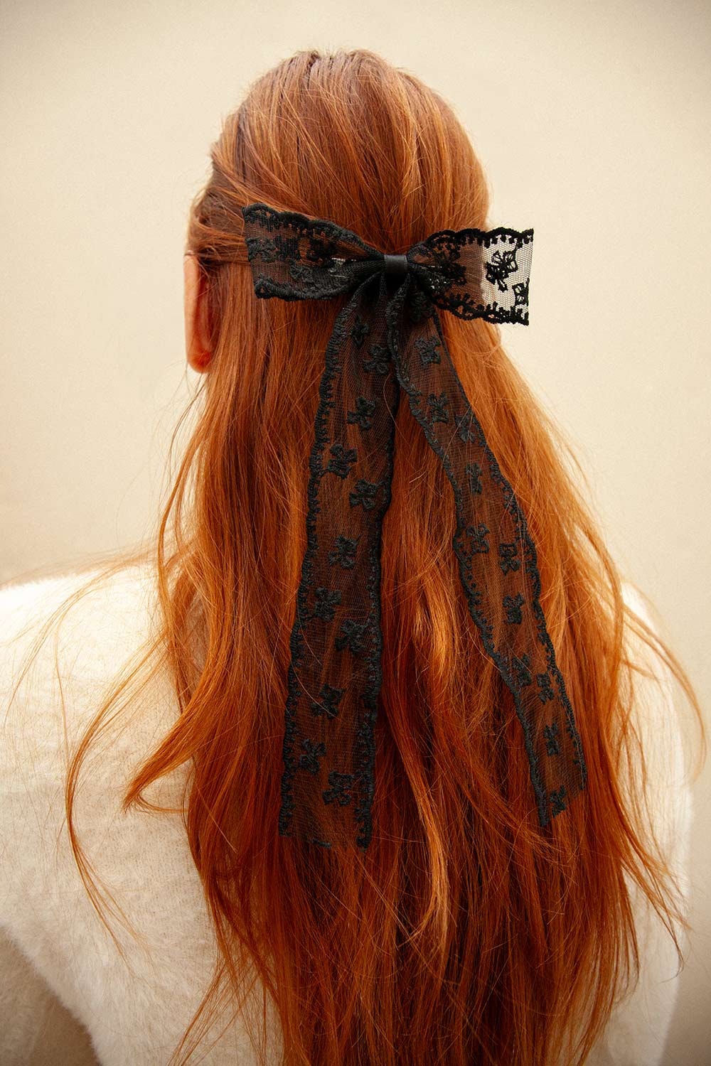 woman wearing Wednesday Black Lacy Bow Hair Clip from Boutique 1861