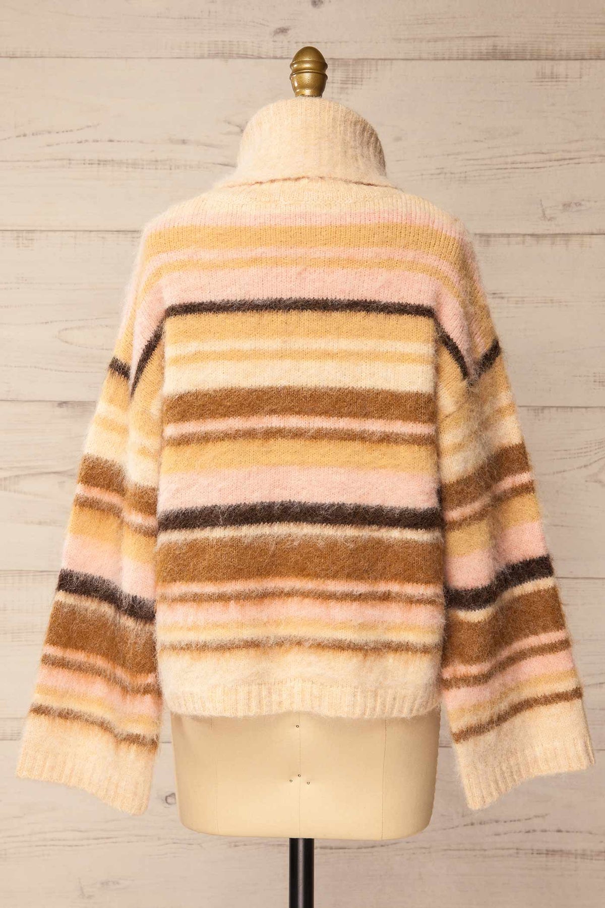 back view of Winokapa Ivory Striped Fuzzy Turtleneck Oversized Sweater at La petite garçonne
