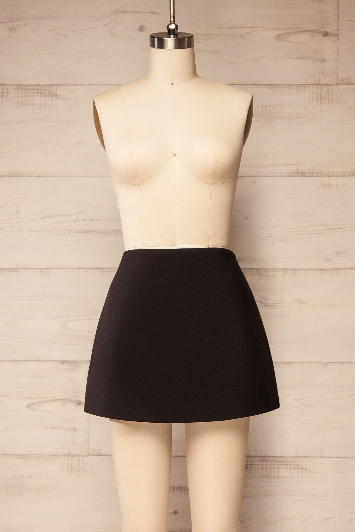 Front view of Woburn Black High-Waisted Tailored Skort at La petite garçonne
