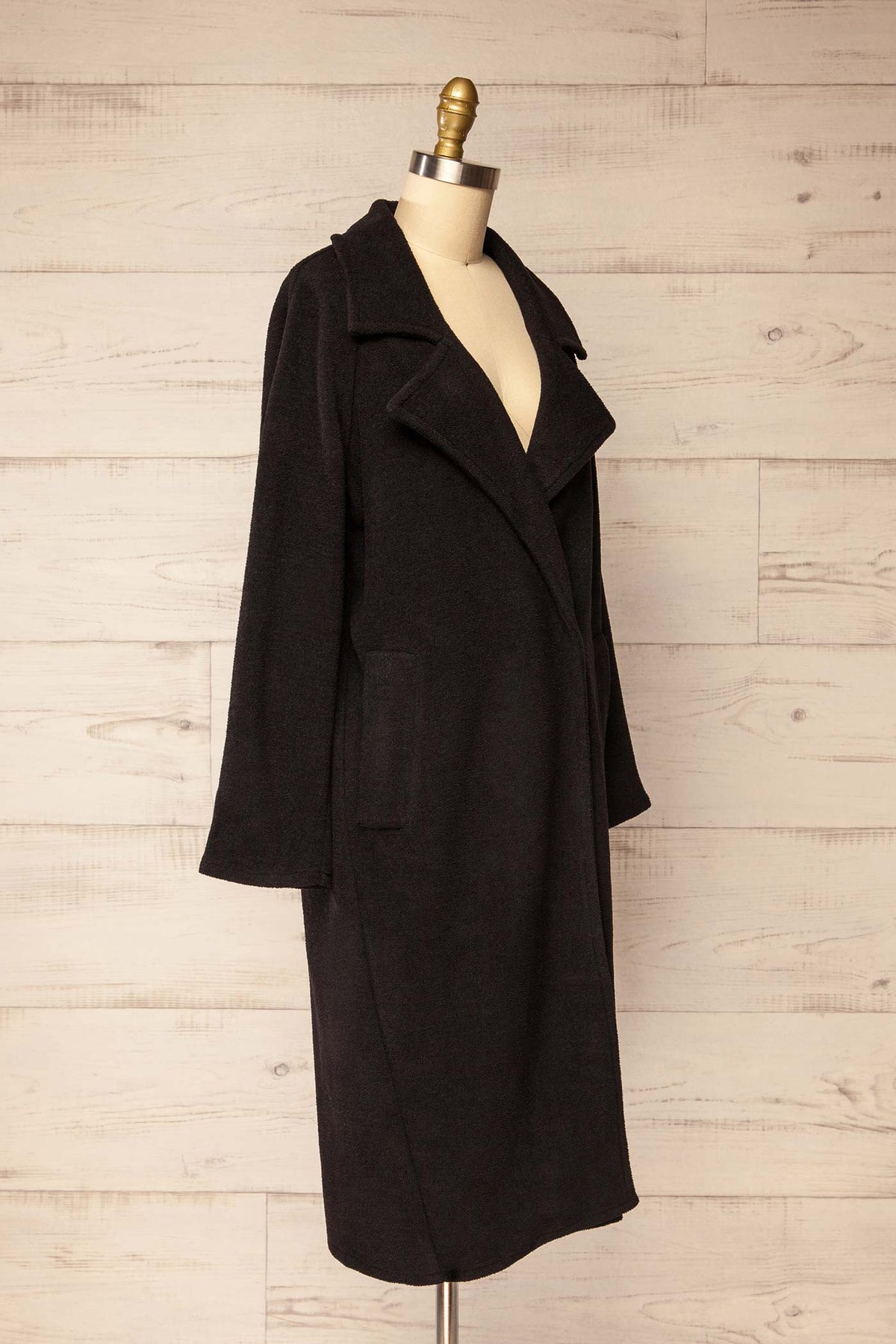 side view of Wollongong Long Black Fleece Coat at La petite garçonne