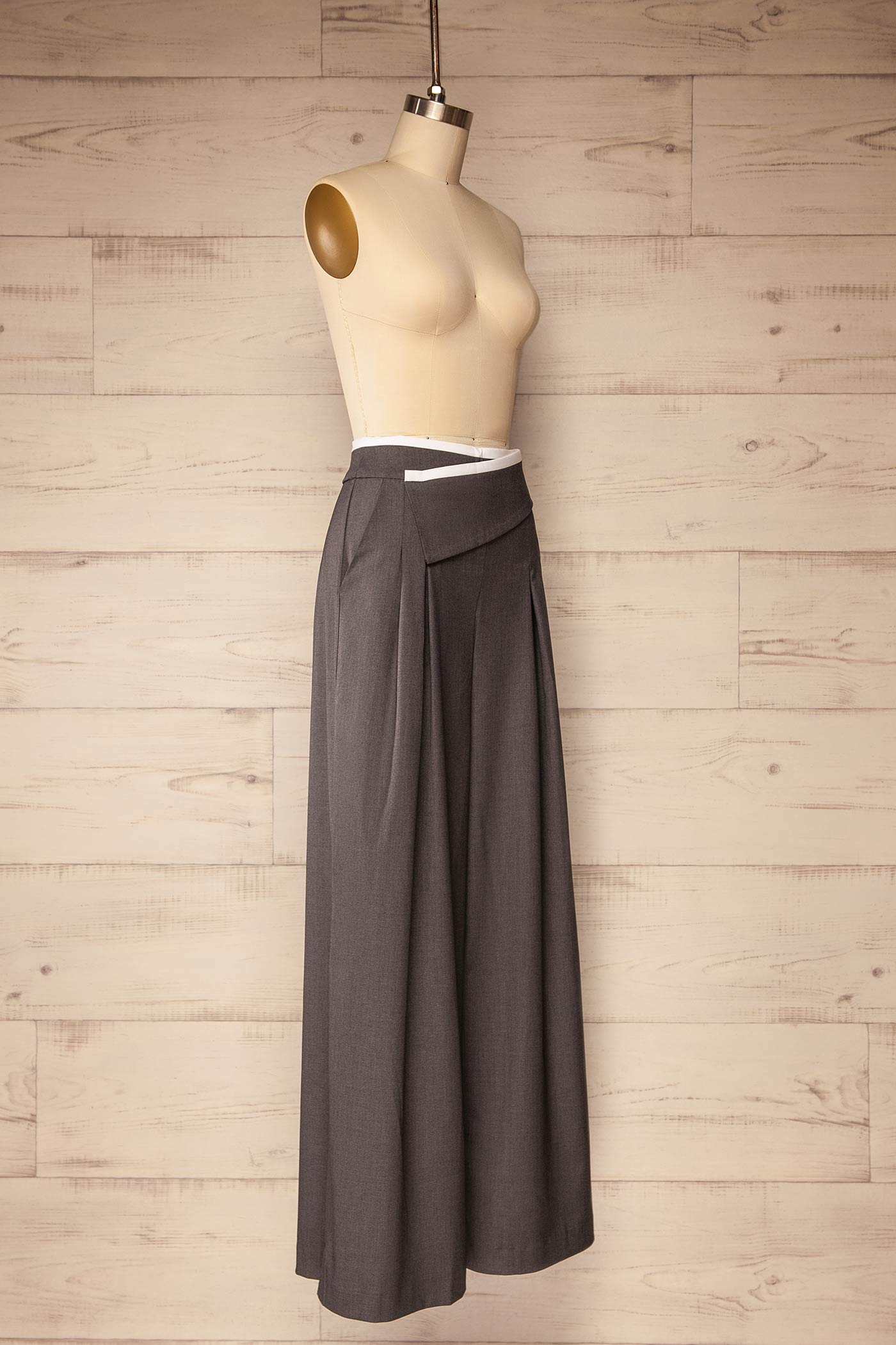 side view of Yakutsk Grey Overlap Wide-Leg Pleated Pants at La petite garçonne