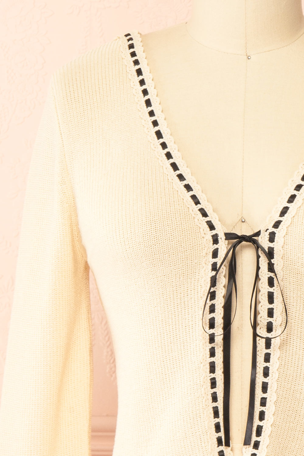 Zafreya Beige Cardigan with Black Ribbon Tie | Boutique 1861 front