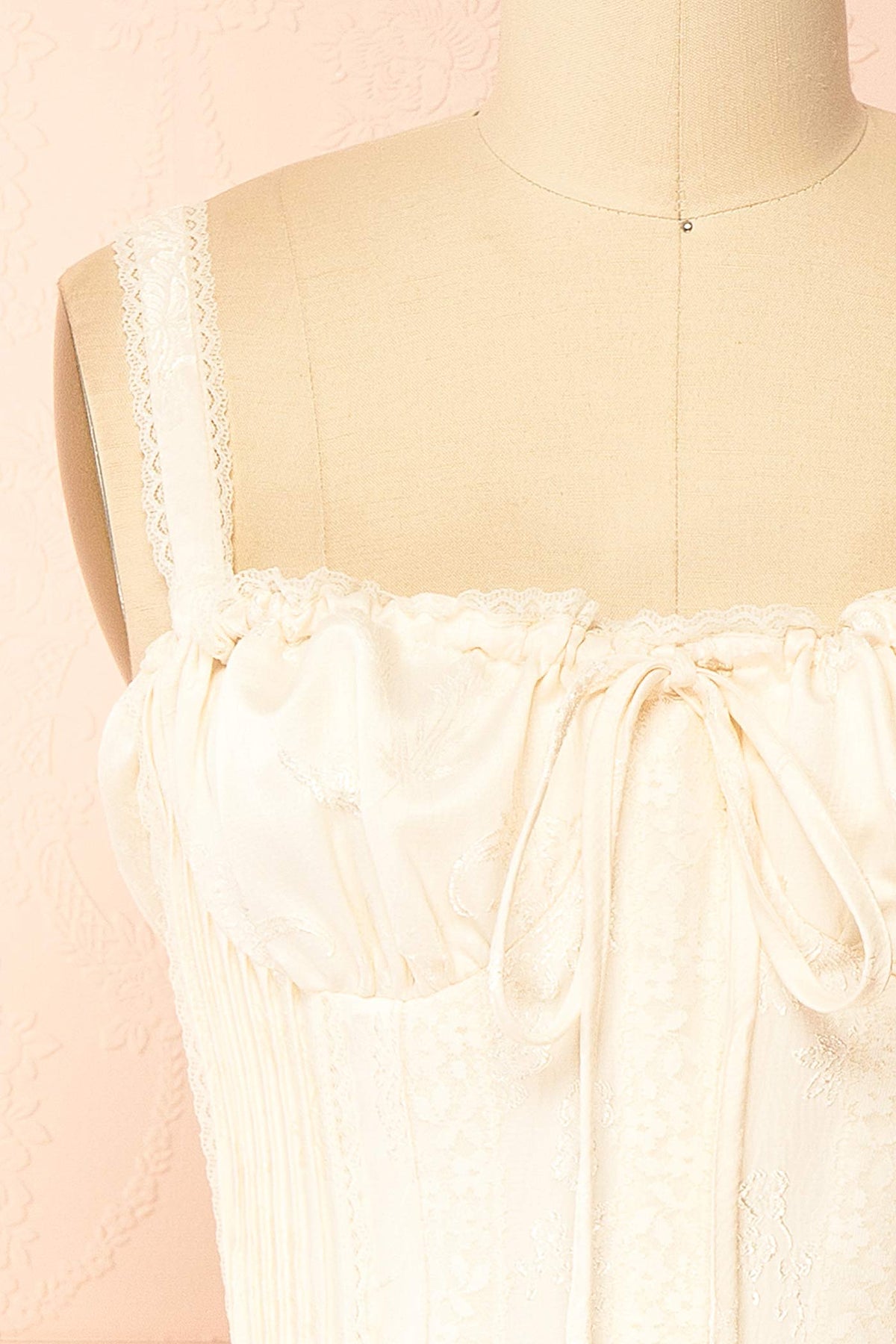 details view of Zolda Ivory Short Jacquard Corset Dress with Back Bow at Boutique 1861