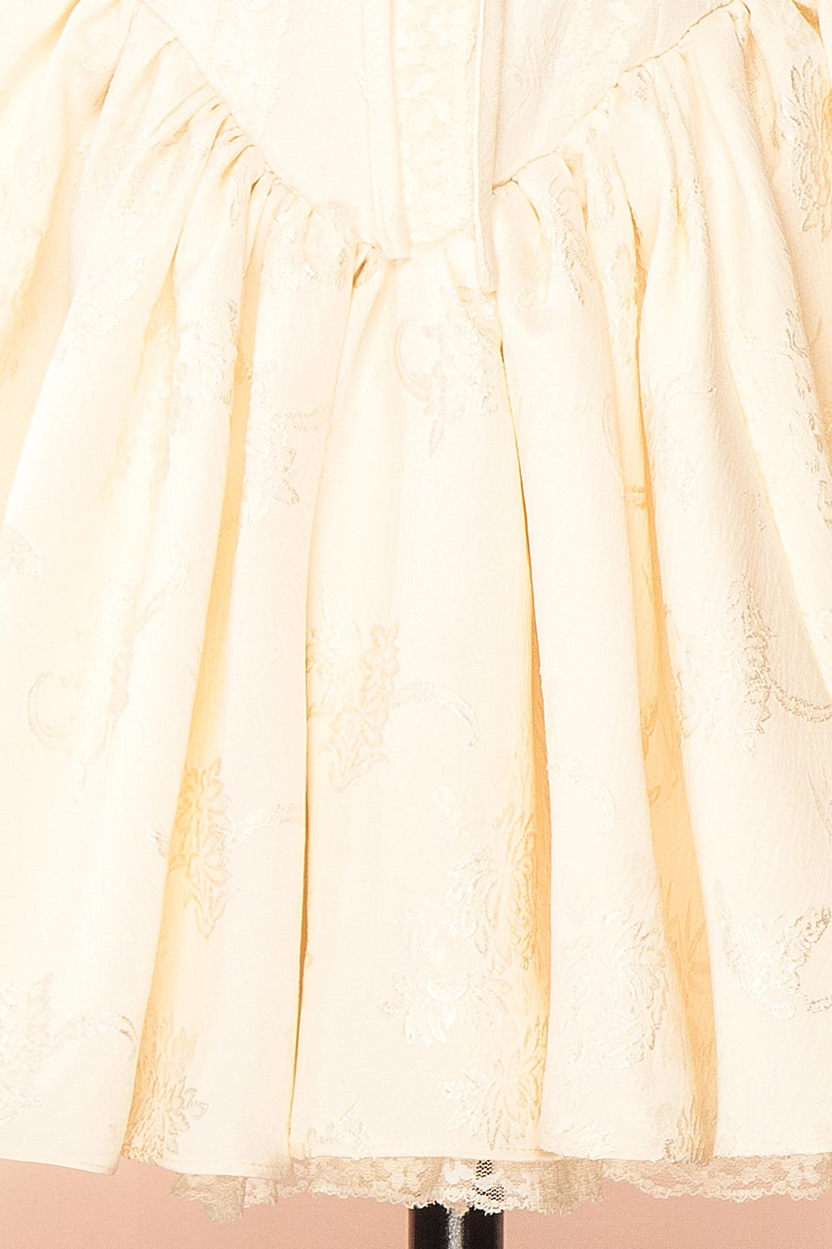 fabric view of Zolda Ivory Short Jacquard Corset Dress with Back Bow at Boutique 1861