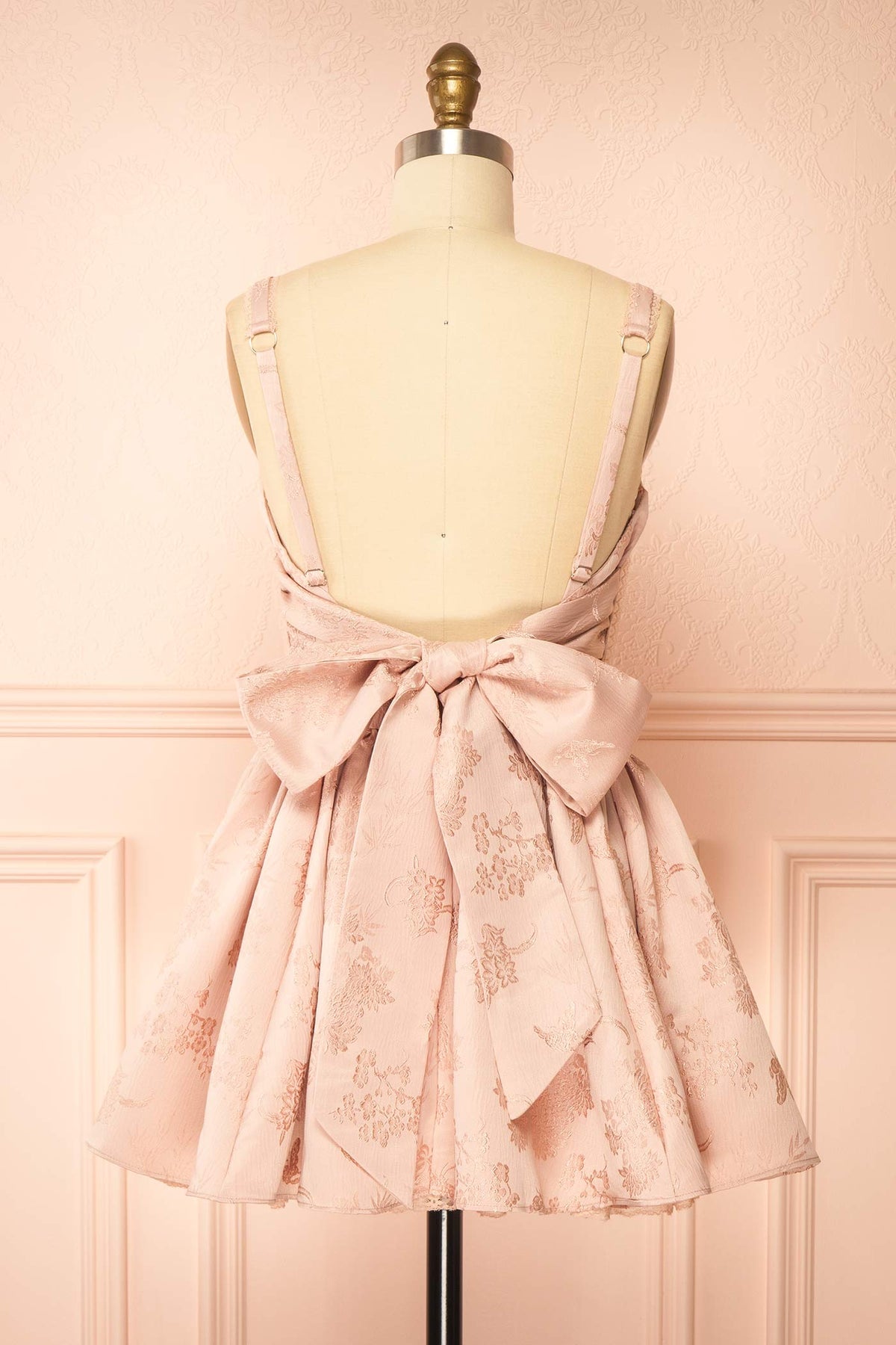 back view of Zolda Pink Short Jacquard Corset Dress with Back Bow at Boutique 1861