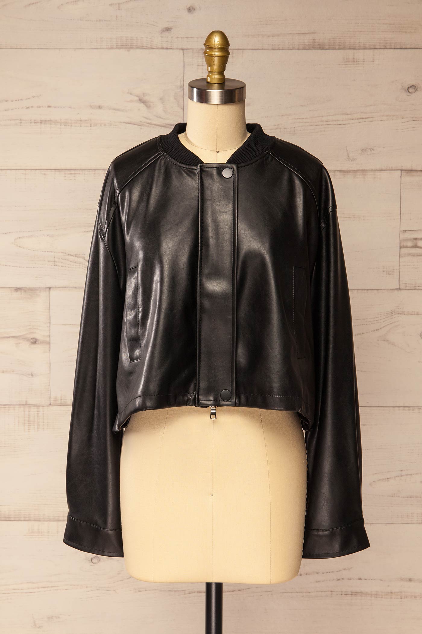 loose front view of Zottegem Black Faux-Leather Cropped Jacket at La petite garçonne