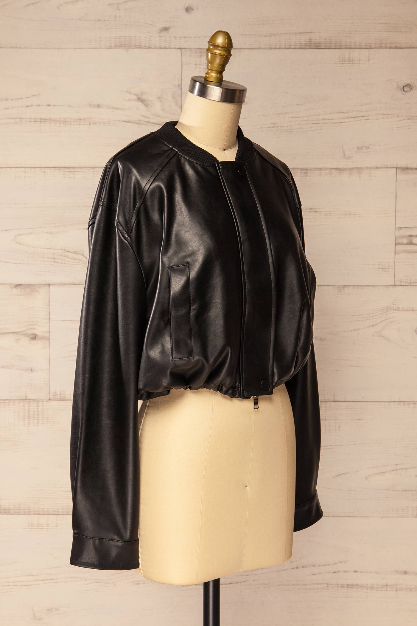 side view of Zottegem Black Faux-Leather Cropped Jacket at La petite garçonne