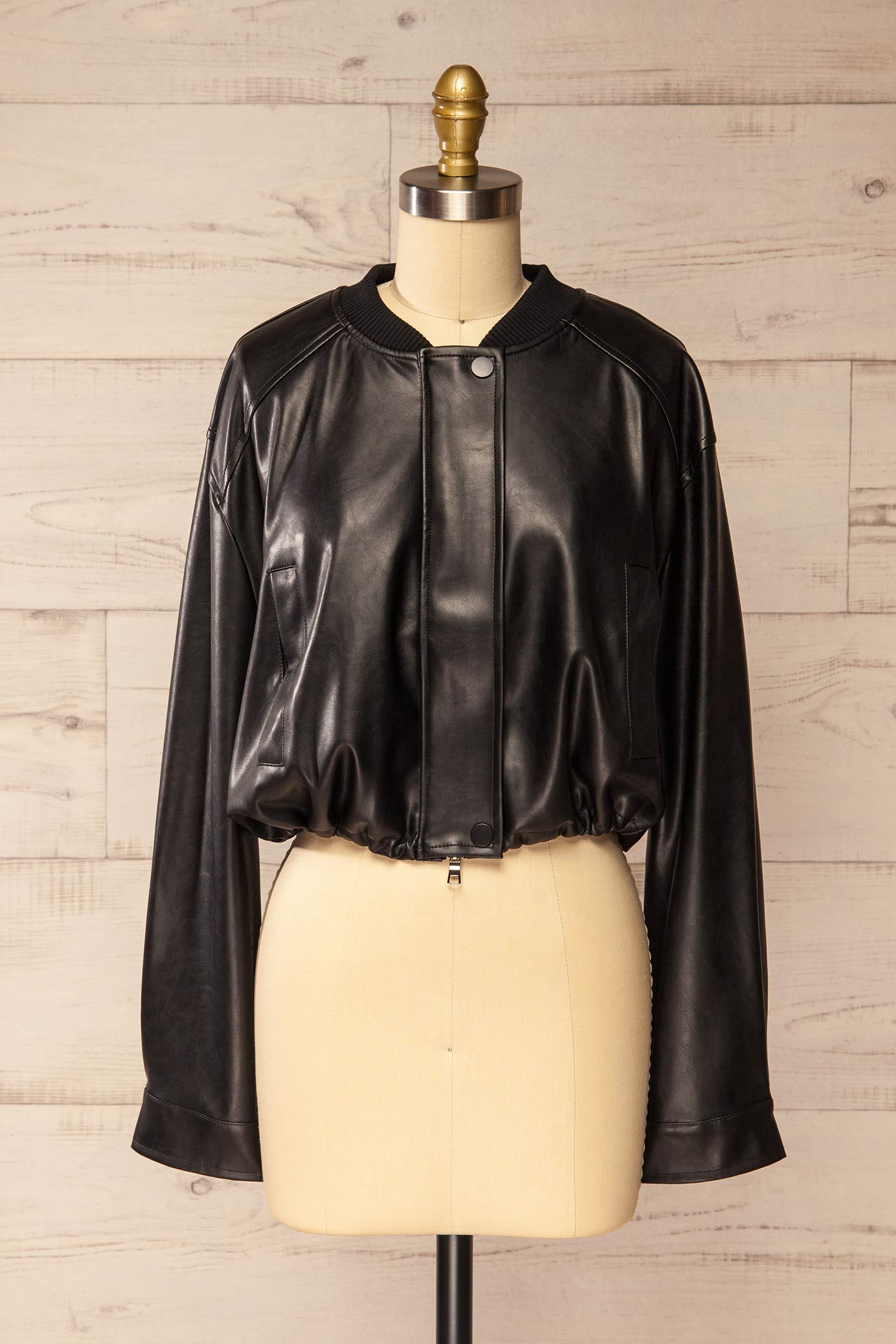 front view of Zottegem Black Faux-Leather Cropped Jacket at La petite garçonne