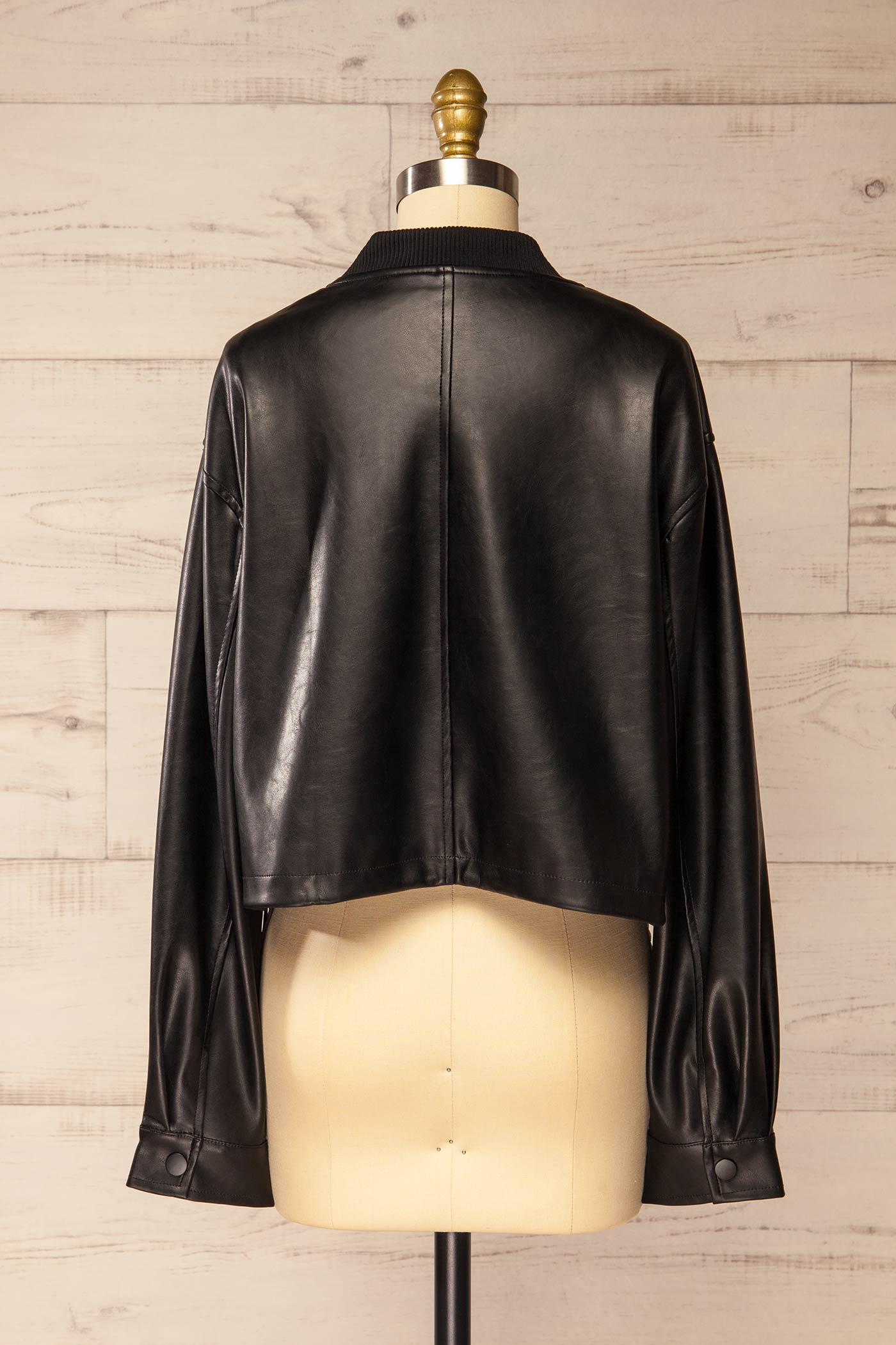loose back view of Zottegem Black Faux-Leather Cropped Jacket at La petite garçonne
