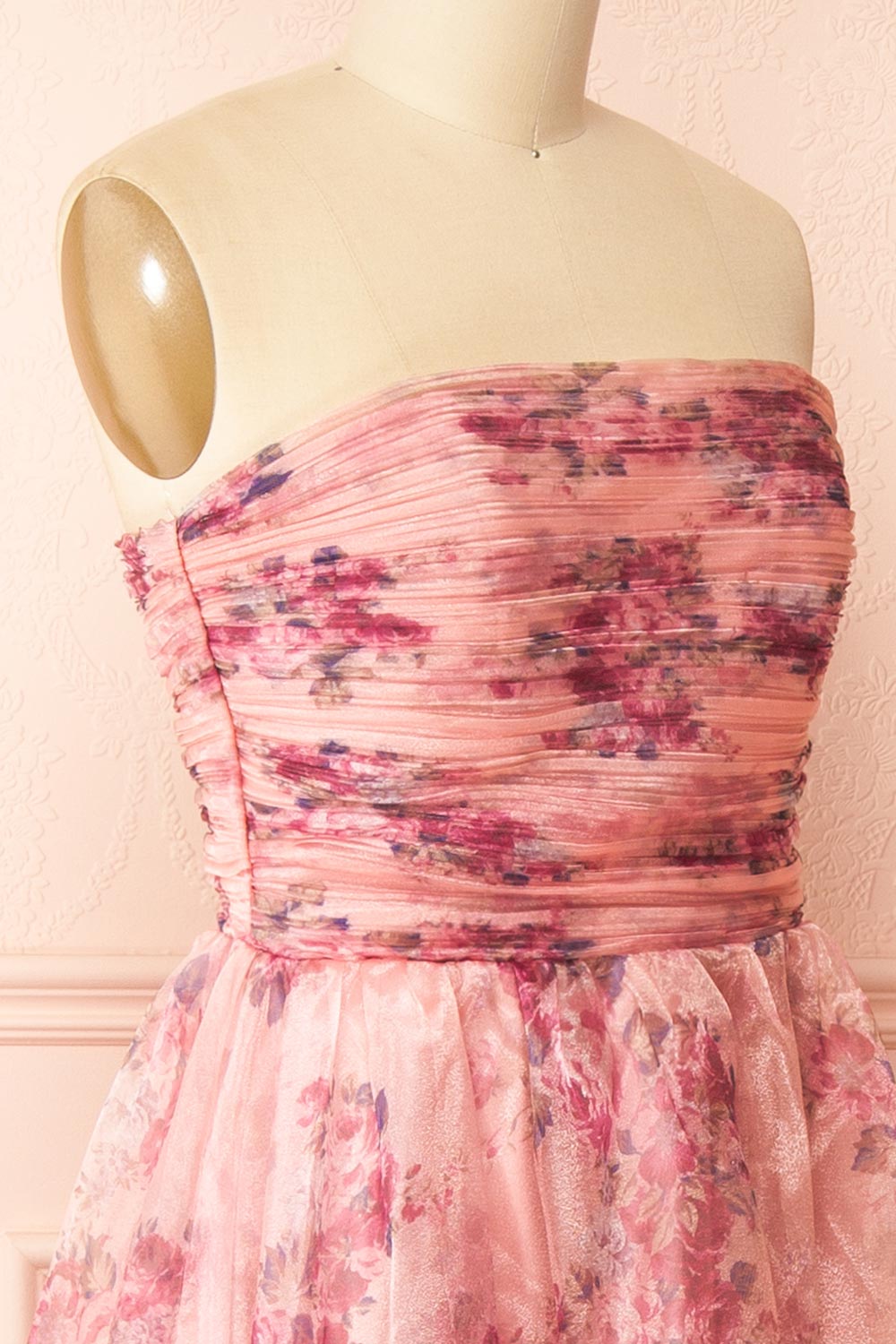 side of sewing mannequin wearing Zouleikha Pink Floral Maxi Strapless Dress from Boutique 1861