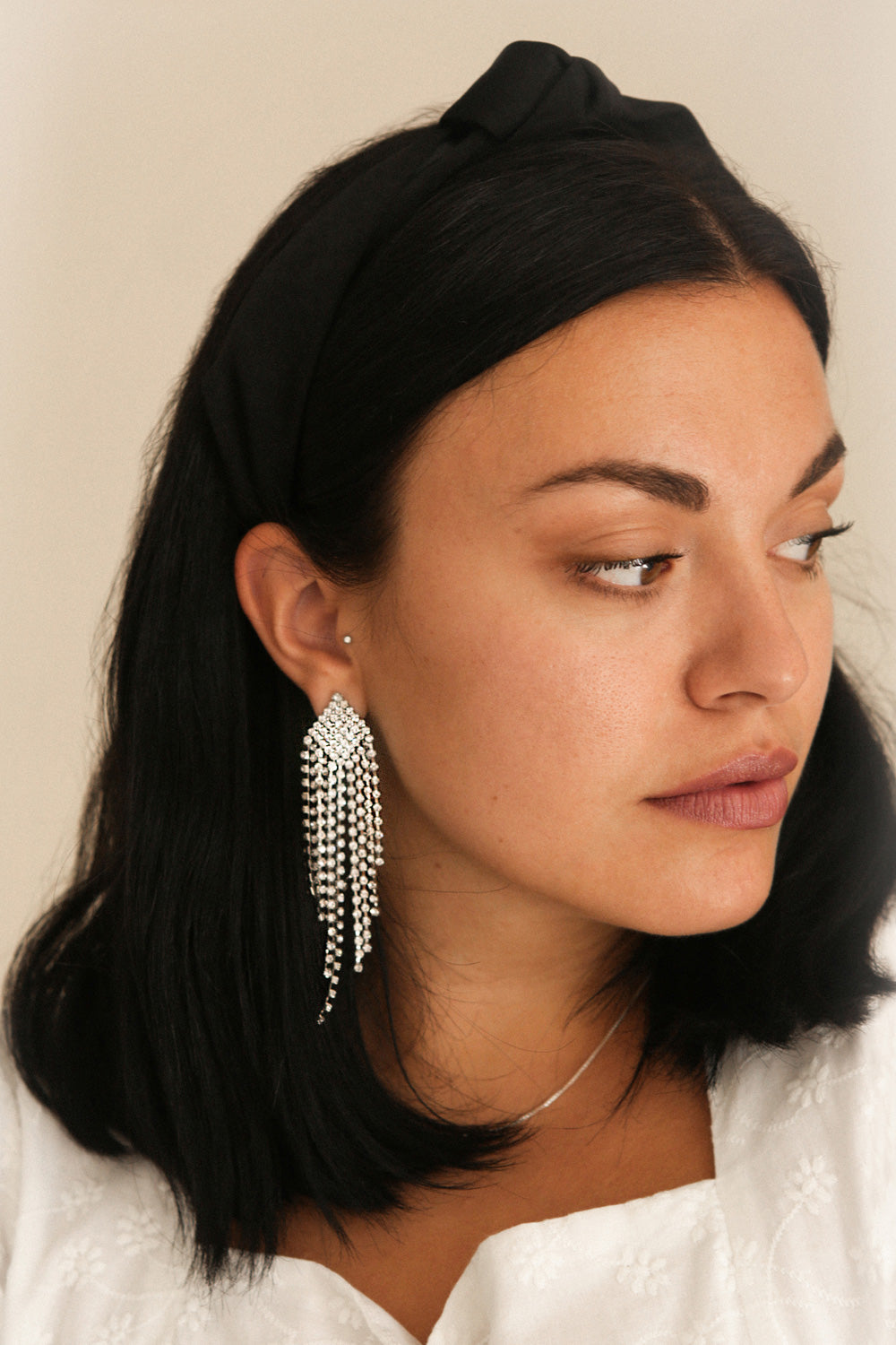 Acritas Silver & Crystal Statement Pendant Earrings | Boutique 1861 on model