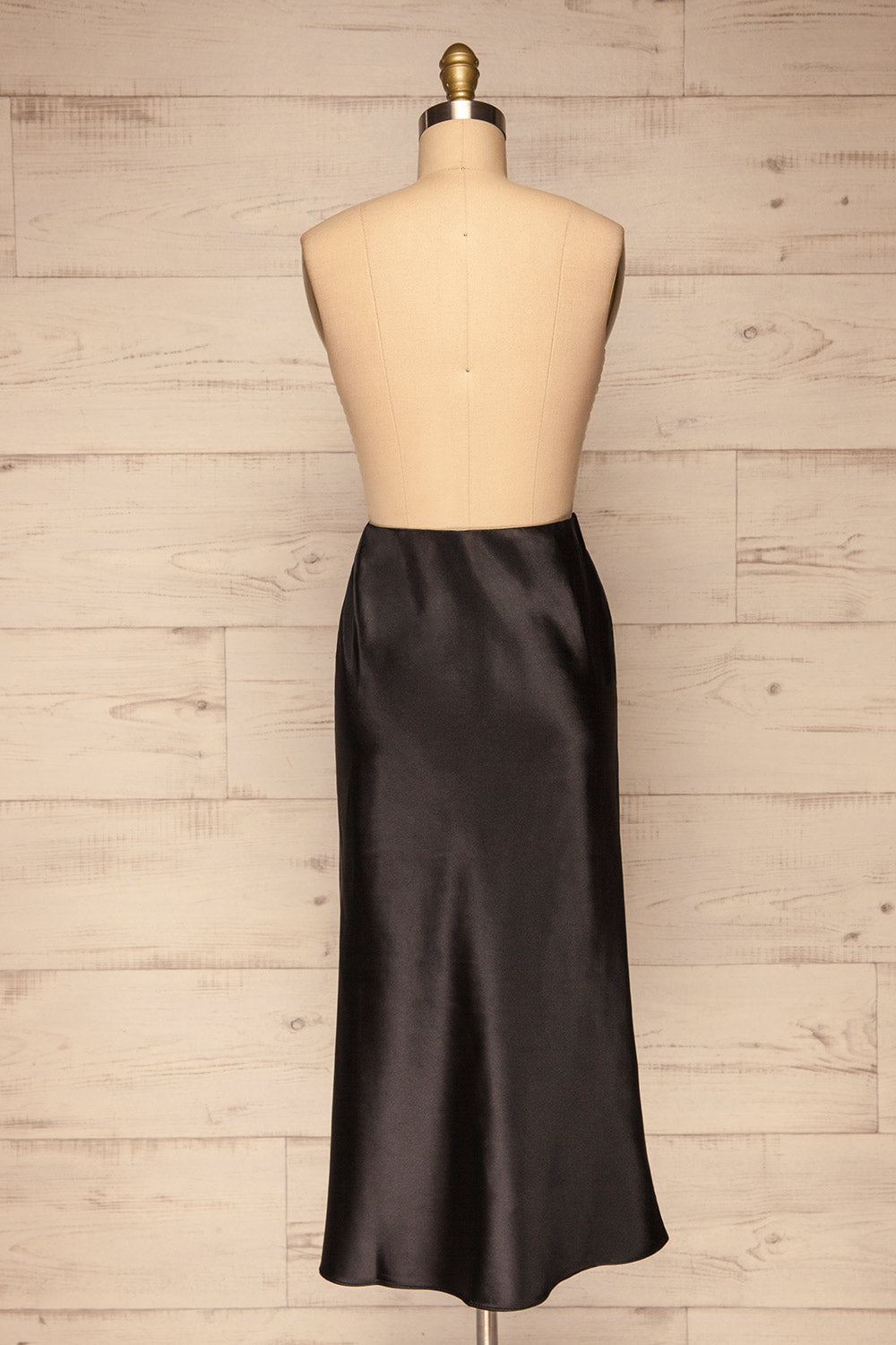Alia Noir Black Midi Satin Skirt | Jupe back view | La Petite Garçonne