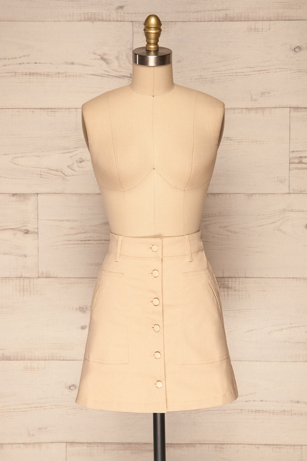 Alijo Beige Button-Up Mini Skirt with Pockets | La Petite Garçonne front view