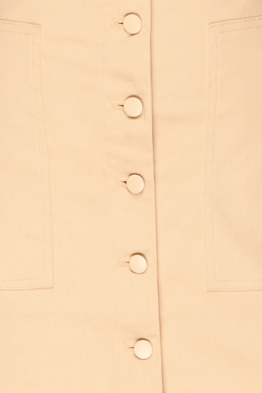 Alijo Beige Button-Up Mini Skirt with Pockets | La Petite Garçonne fabric detail
