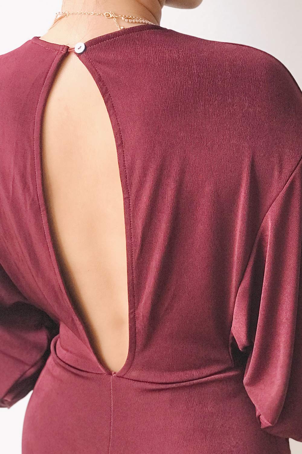 Xurne Wine Long Sleeve Shimmery Romper | La petite garçonne model back