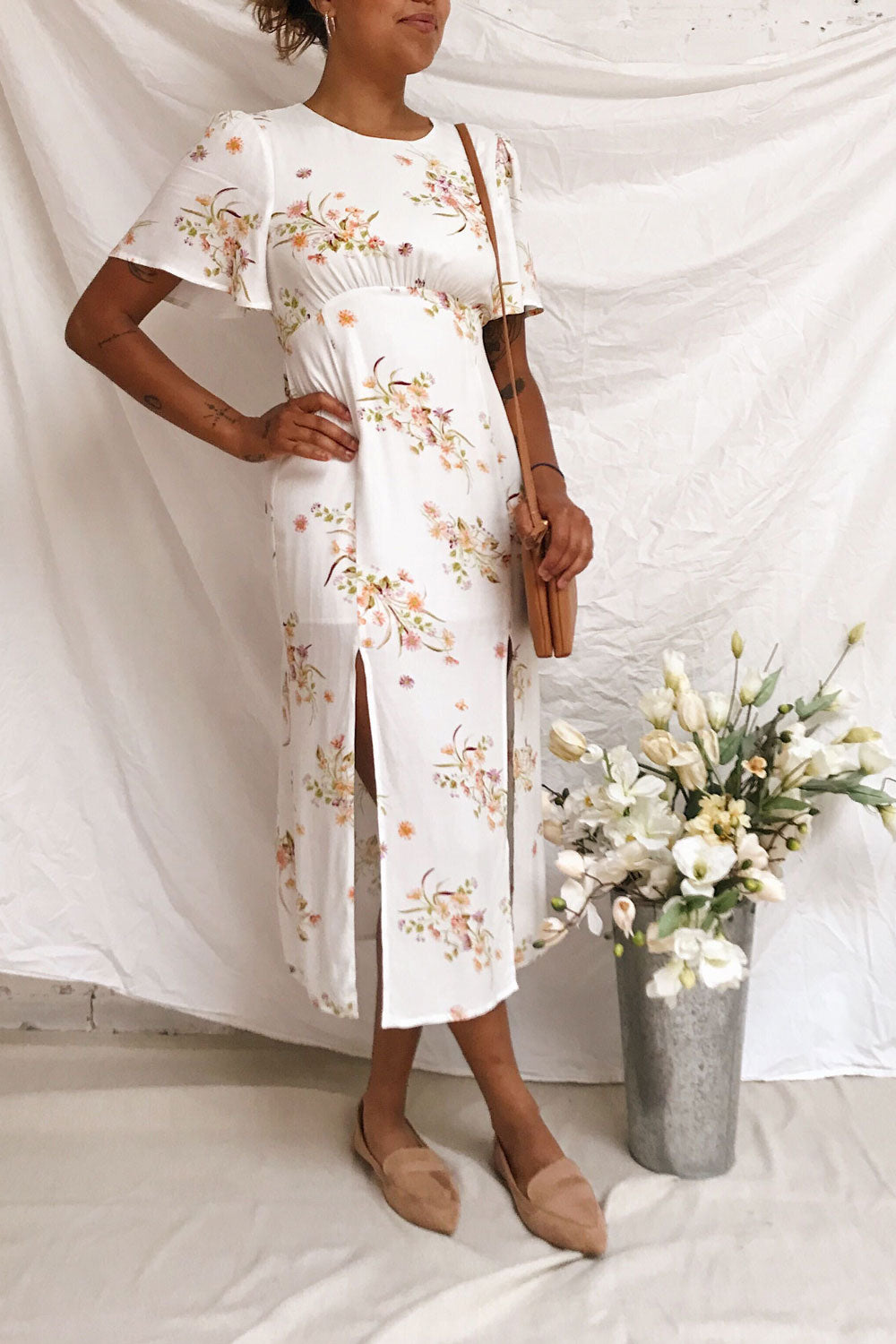 Briwate White Floral Short Sleeve Midi Dress | Boutique 1861 model look