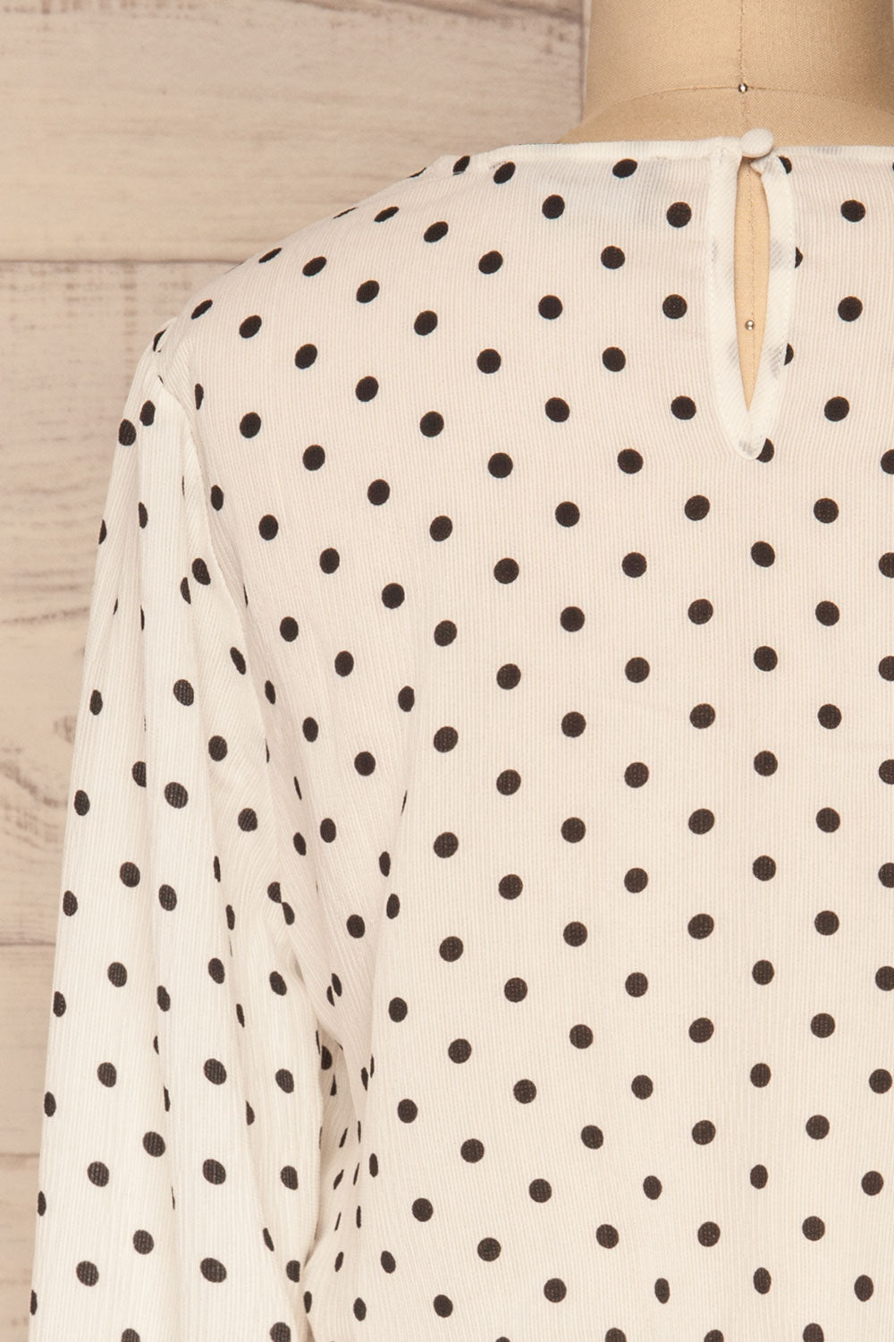 Czersk Blanc White Polkadot Long Sleeved Top | La Petite Garçonne back close-up