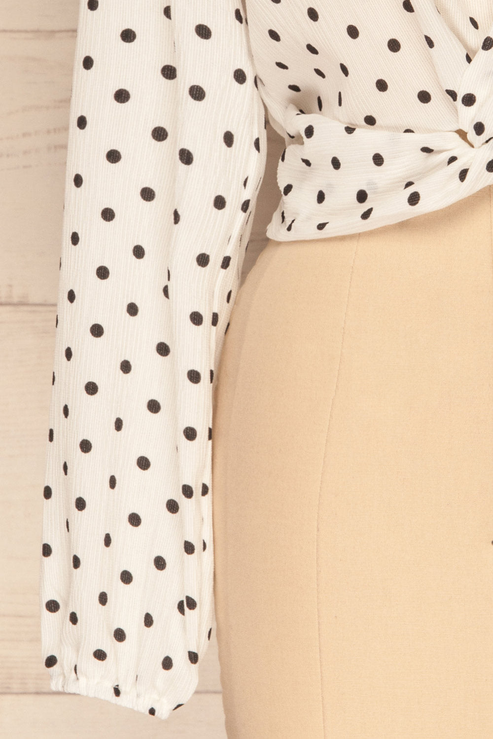Czersk Blanc White Polkadot Long Sleeved Top | La Petite Garçonne sleeve close-up