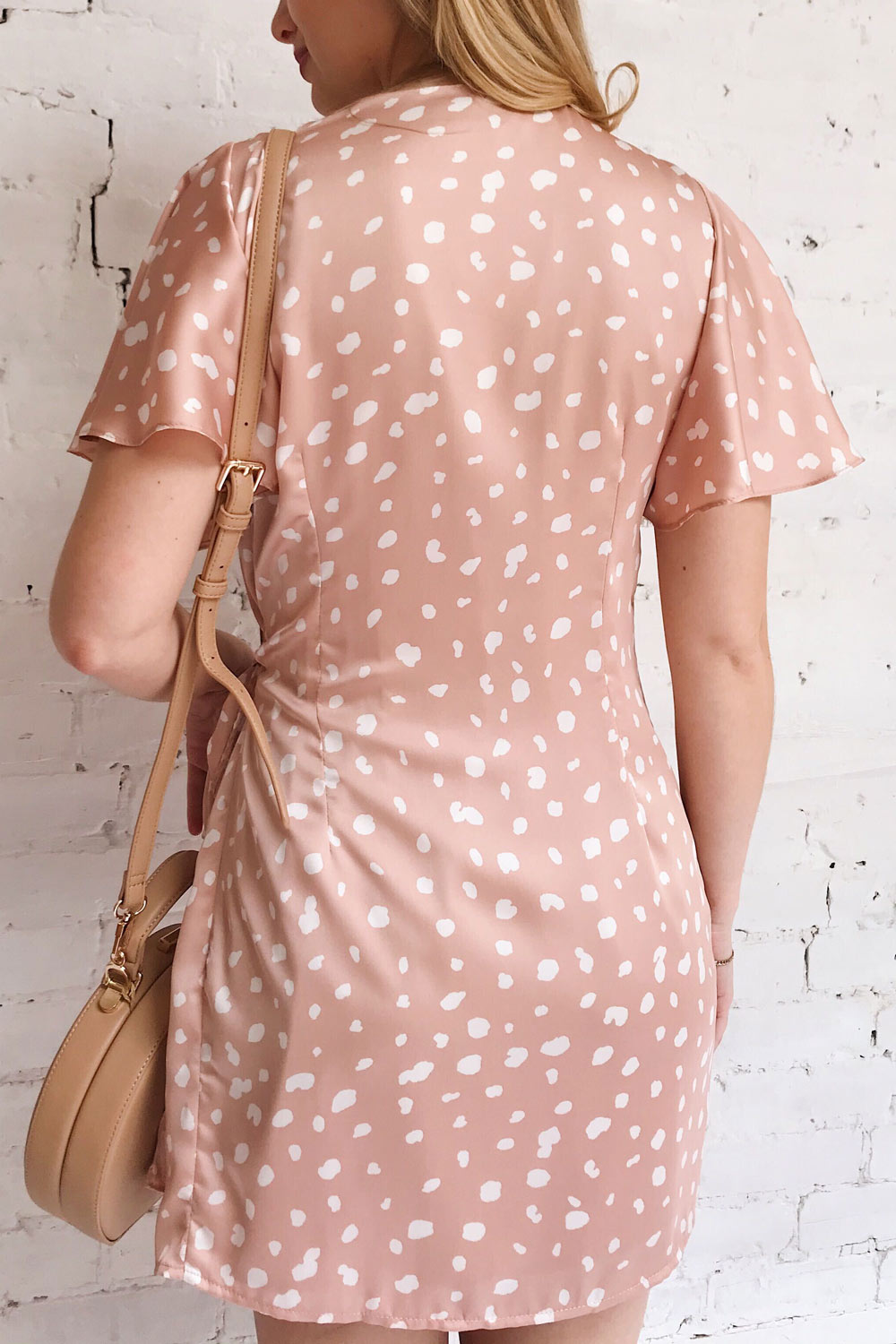 Tryphena Pink Short Sleeved Wrap Dress | La petite garçonne on model