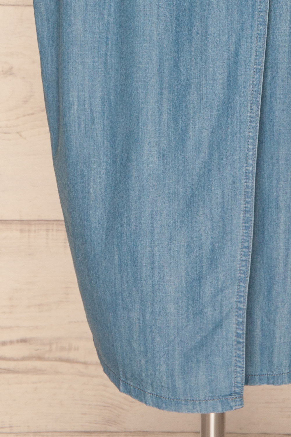 Eggkleiva Light Blue Denim Midi Wrap Dress | La Petite Garçonne bottom close-up
