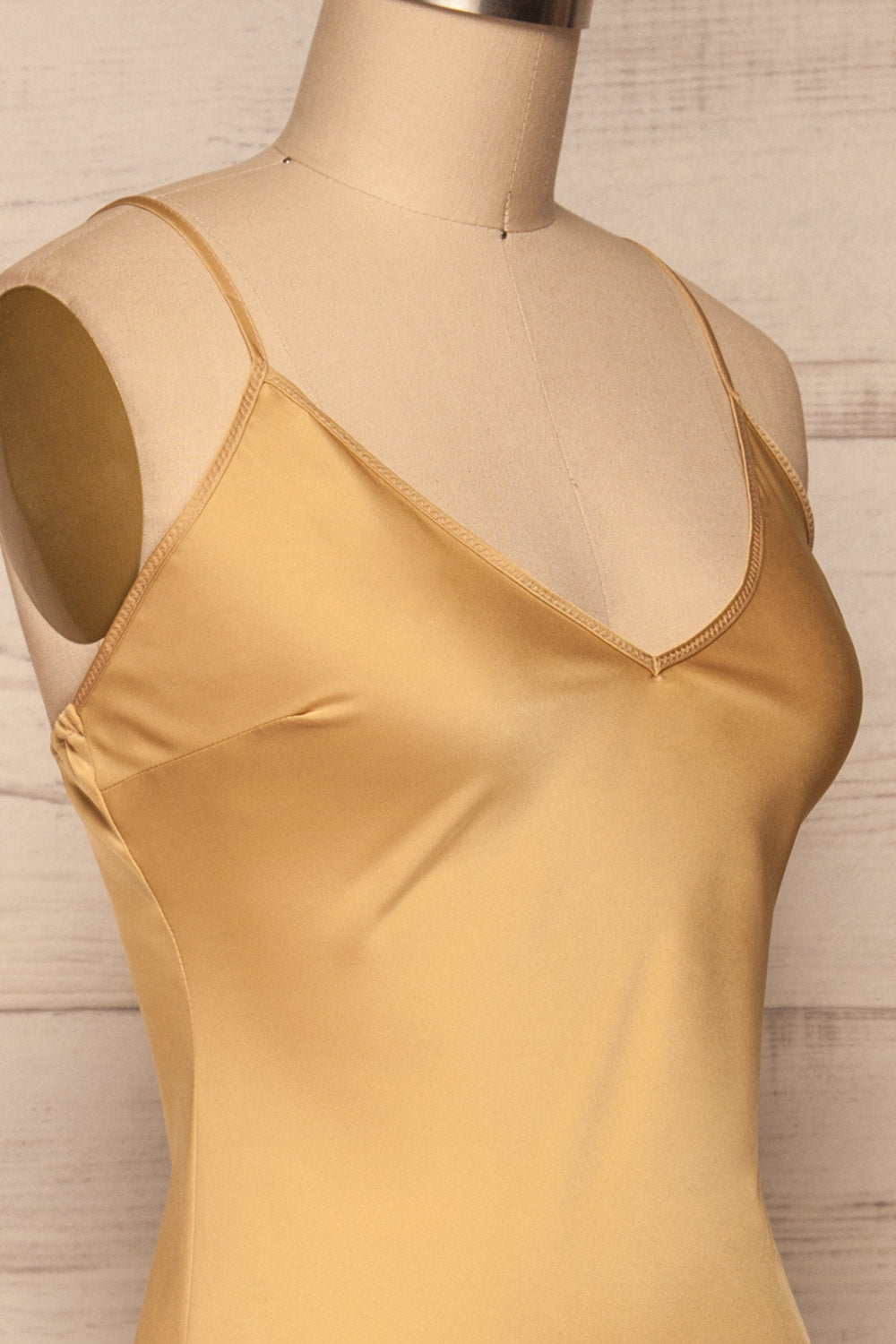 Enea Champagne Yellow Satin Midi Slip Dress | La Petite Garçonne side close-up