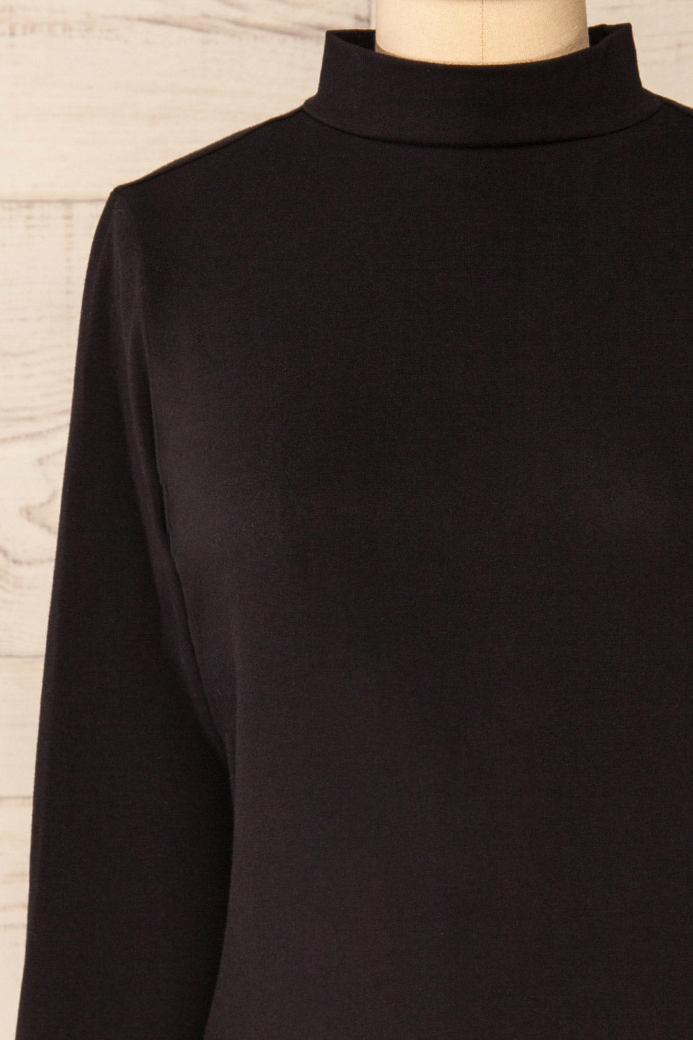 Falejde Black Long Sleeve Mock Neck Top | La petite garçonne front close-up