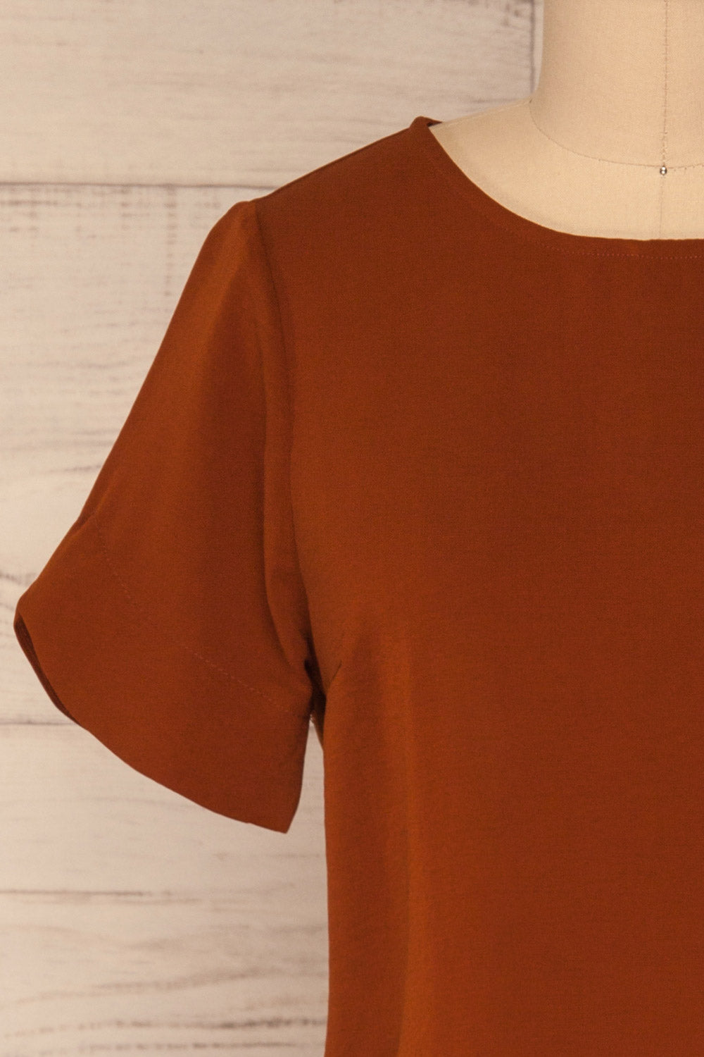 Fallet Rust Brown Boxy Short Sleeved Top | La Petite Garçonne front close-up