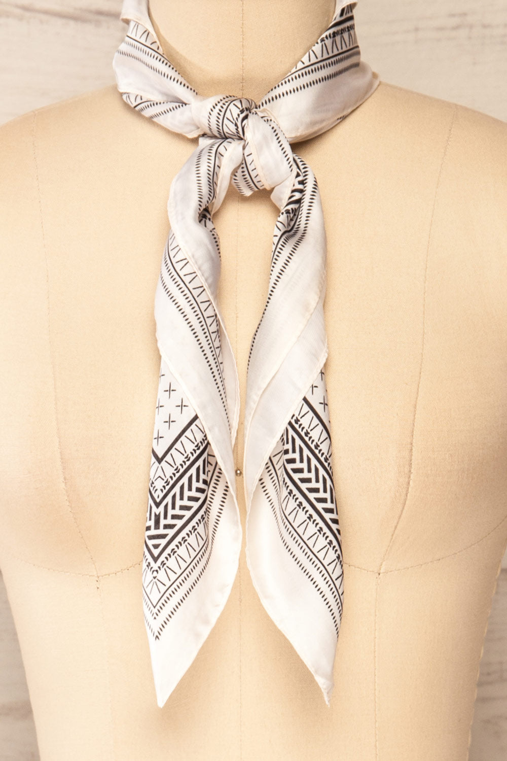 Fornax Beige & Black Patterned Silky Scarf | La petite garçonne knot close-up