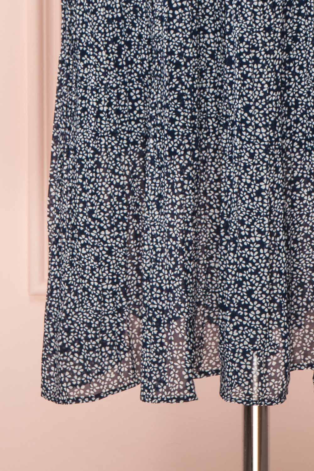 Georgiy Navy Blue Floral Midi Dress with Puff Sleeves | BOTTOM CLOSE UP | Boutique 1861