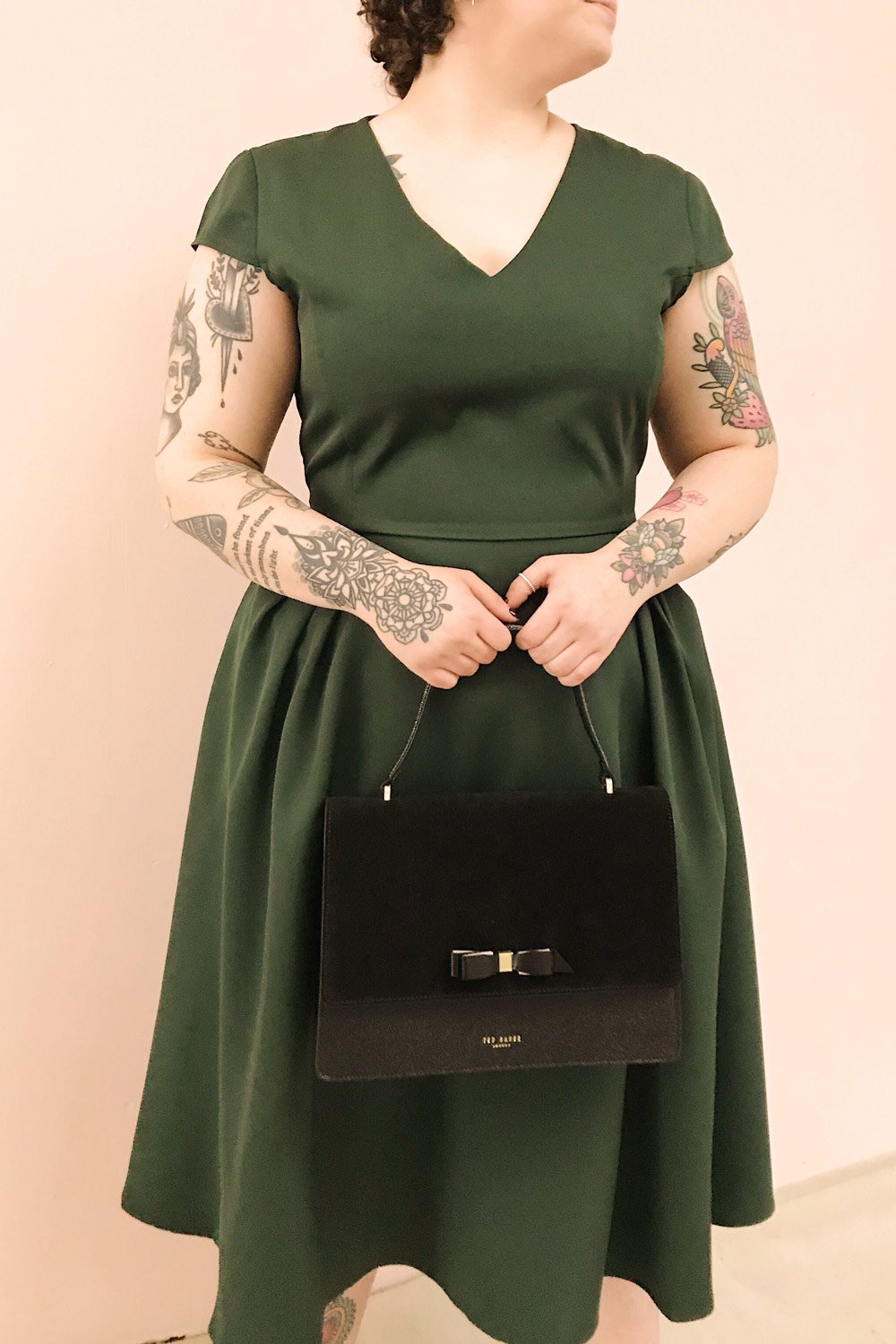 Iktomi Green V-Neck A-Line Midi Dress | Boutique 1861 on model