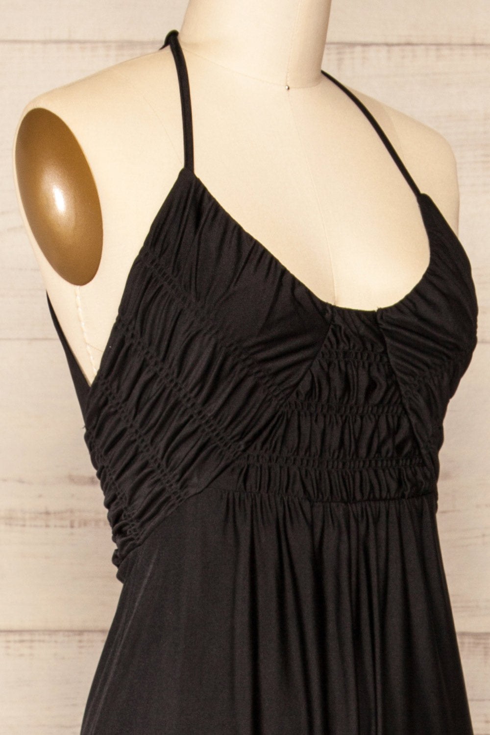 Imatra Black Flare Leg Jumpsuit w/ Tied Straps | La petite garçonne side close-up